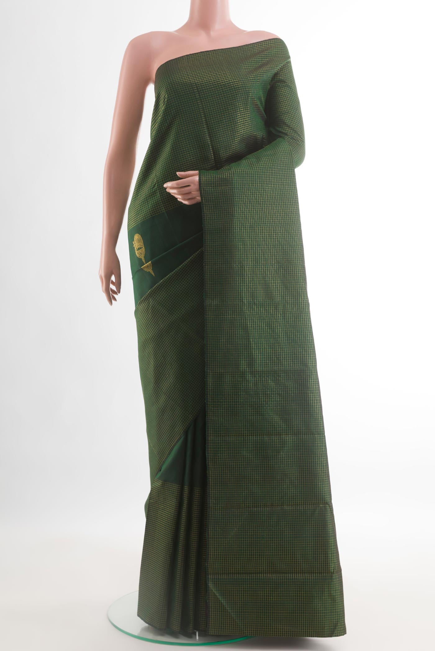 Bottle Green Kanjivaram Silk Saree with Zari Butta on the body and Zari Border.  displayed on a mannequin
