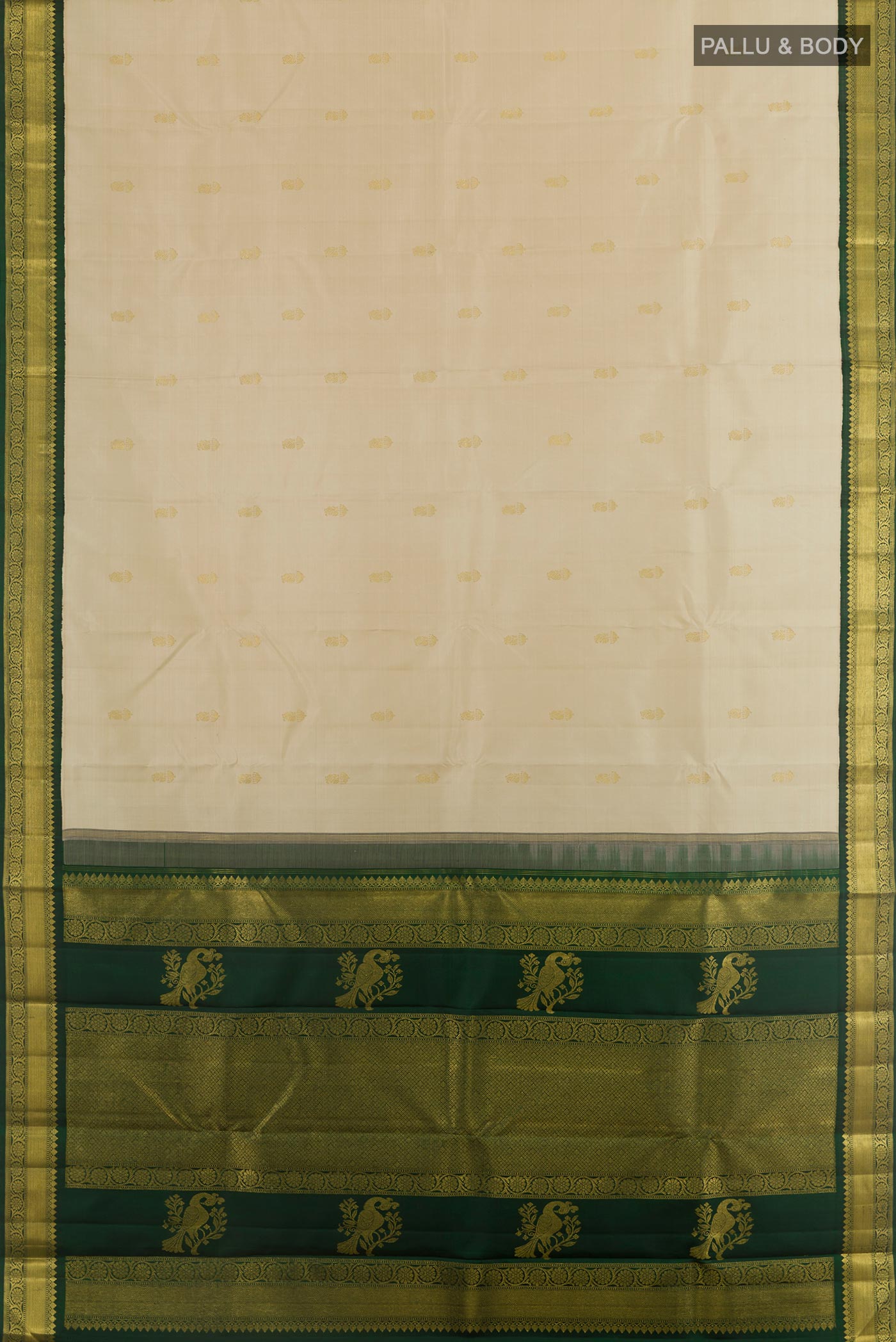 Flat view of Off White Kanchipuram Silk Saree with Zari Butta on the body and Zari Border. 