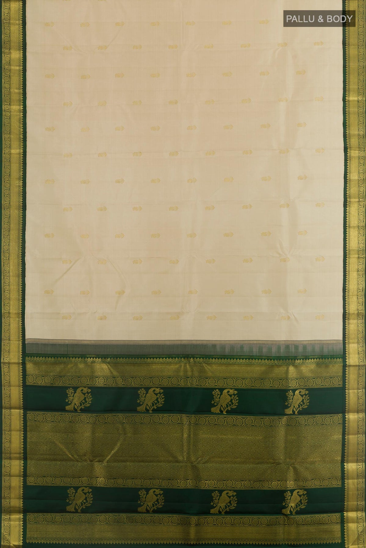 Flat view of Off White Kanchipuram Silk Saree with Zari Butta on the body and Zari Border. 