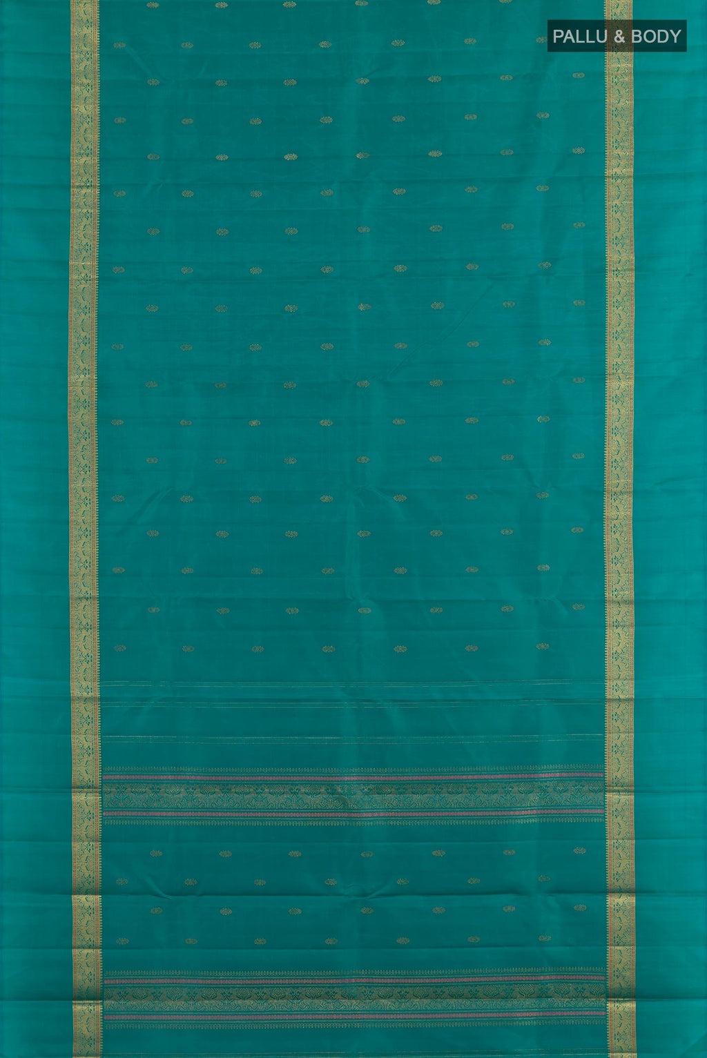 Flat view of Peacock Blue Kanchipuram Silk Saree with Zari Butta on the body and Zari Border. 