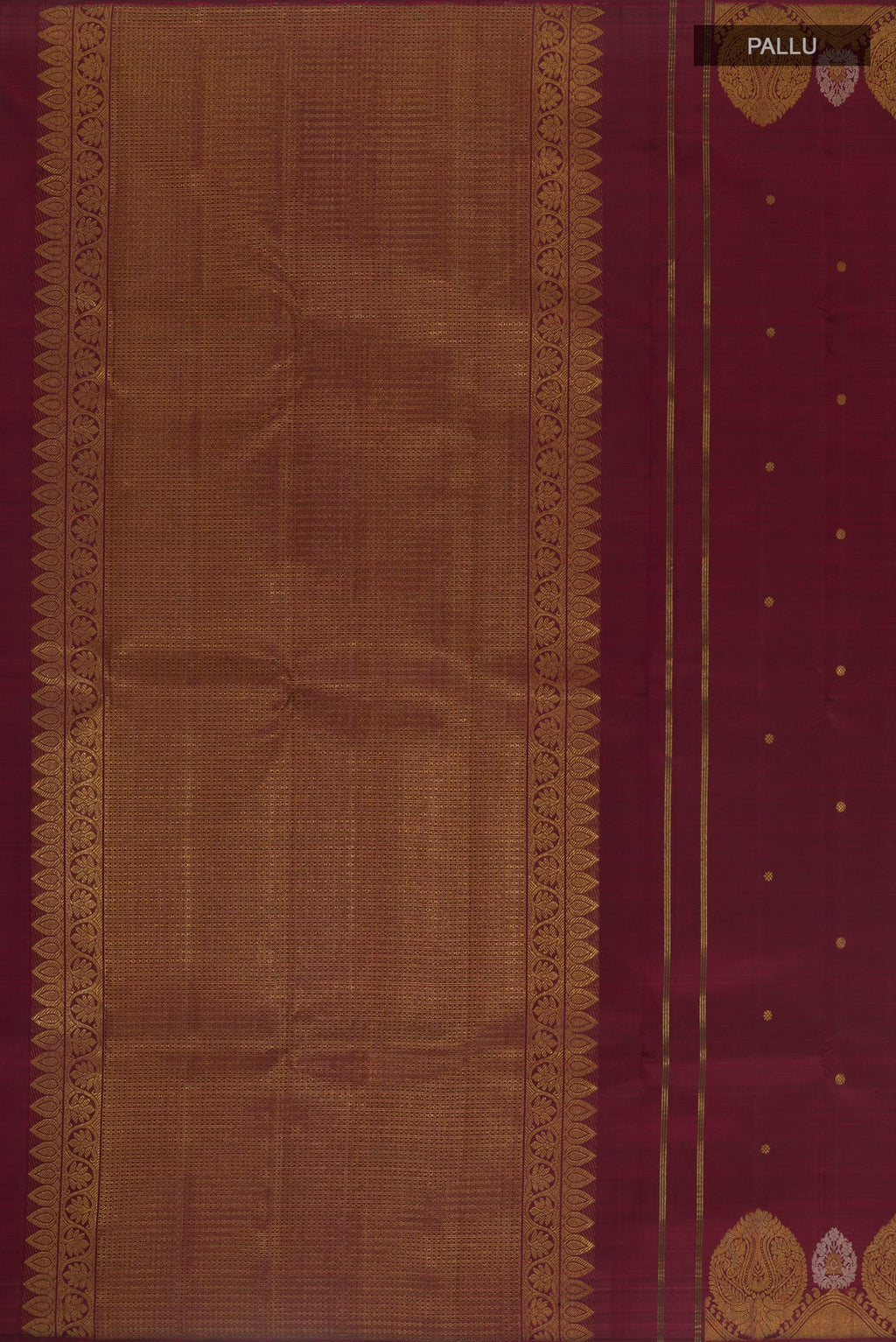 Close up image of the pallu of Maroon Kanchipuram Silk Saree with Zari Butta on the body and Zari Border. 