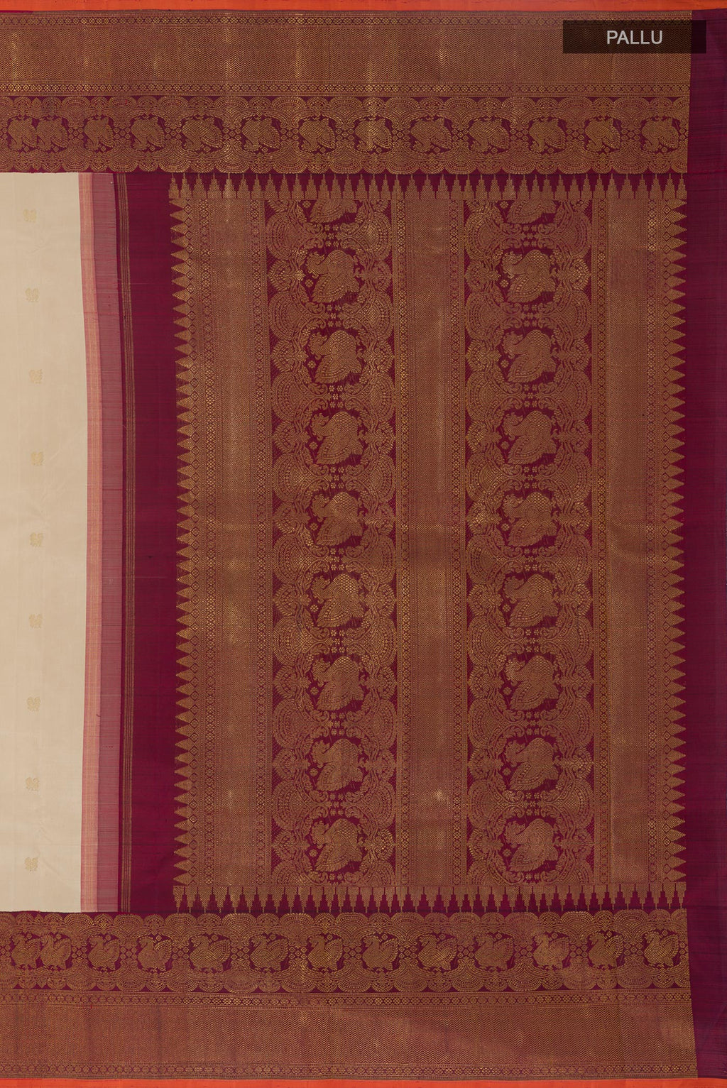 Close up image of the pallu of Off White Kanchipuram Silk Saree with Zari Butta on the body and Zari Border. 