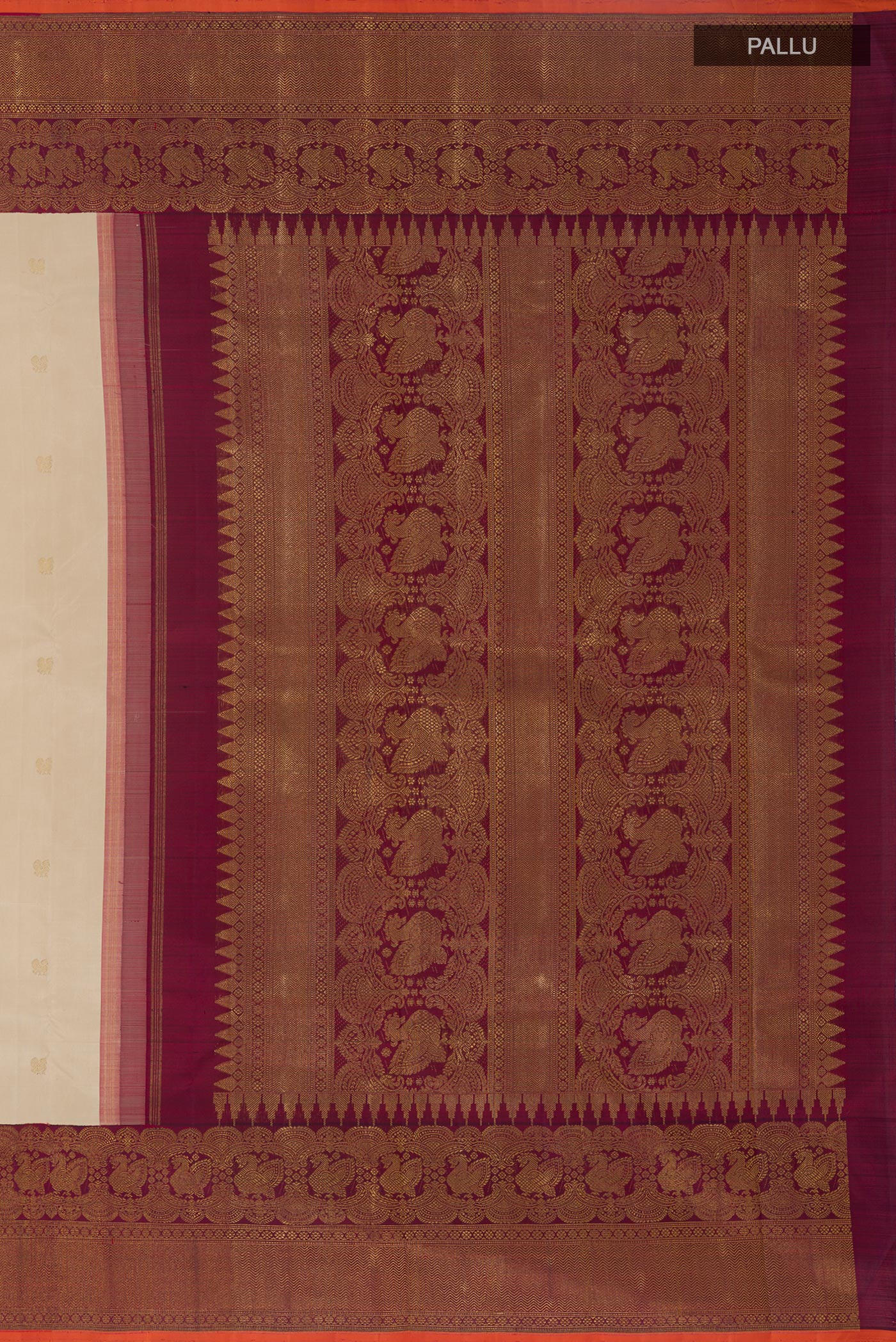 Close up image of the pallu of Off White Kanchipuram Silk Saree with Zari Butta on the body and Zari Border. 