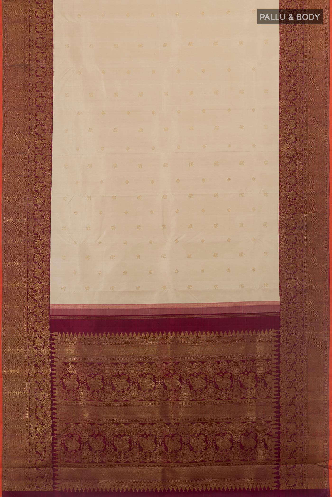 Flat view of Off White Kanchipuram Silk Saree with Zari Butta on the body and Zari Border. 