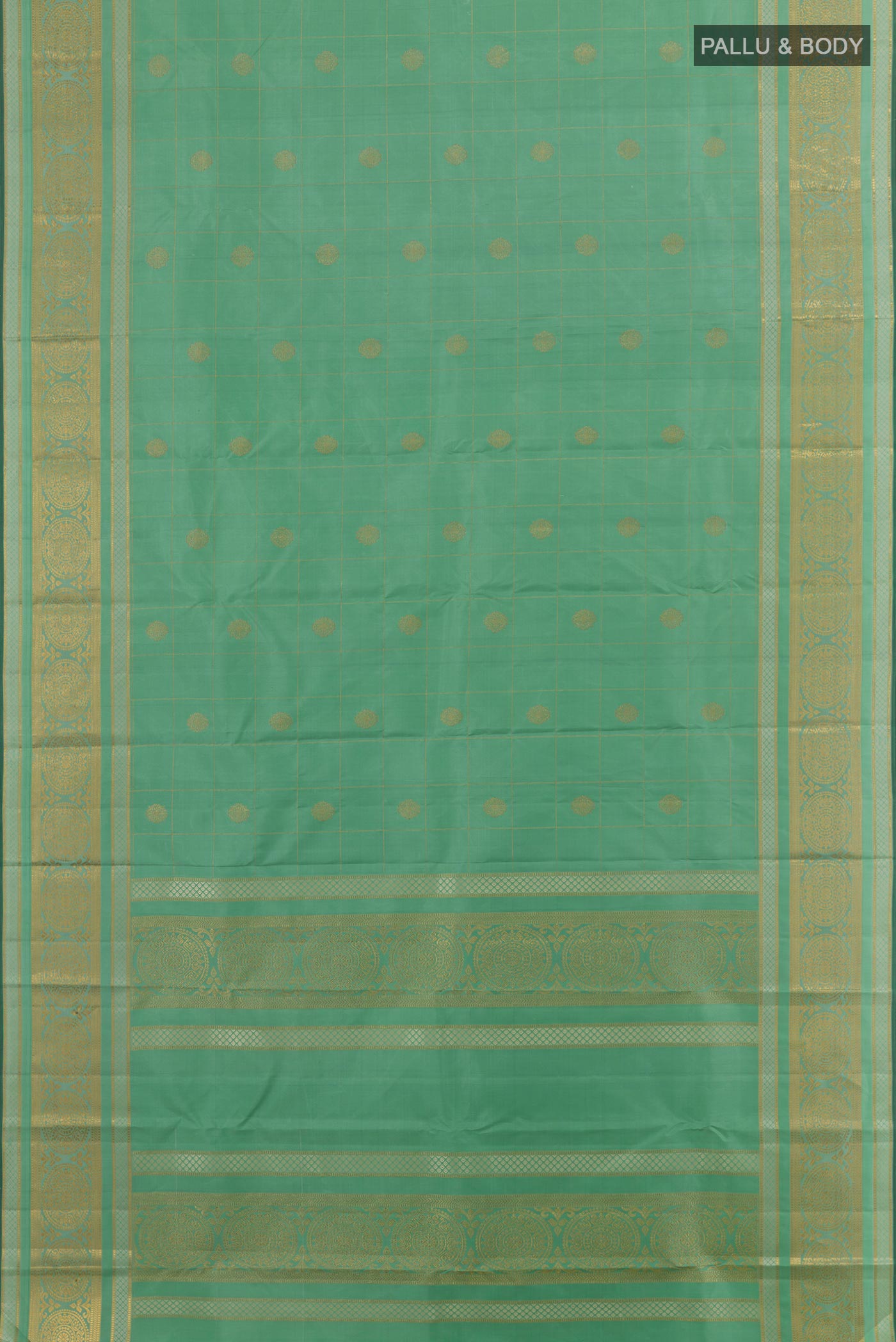Flat view of Light Green Kanjivaram Silk Saree with Zari Butta on the body and Zari Border. 