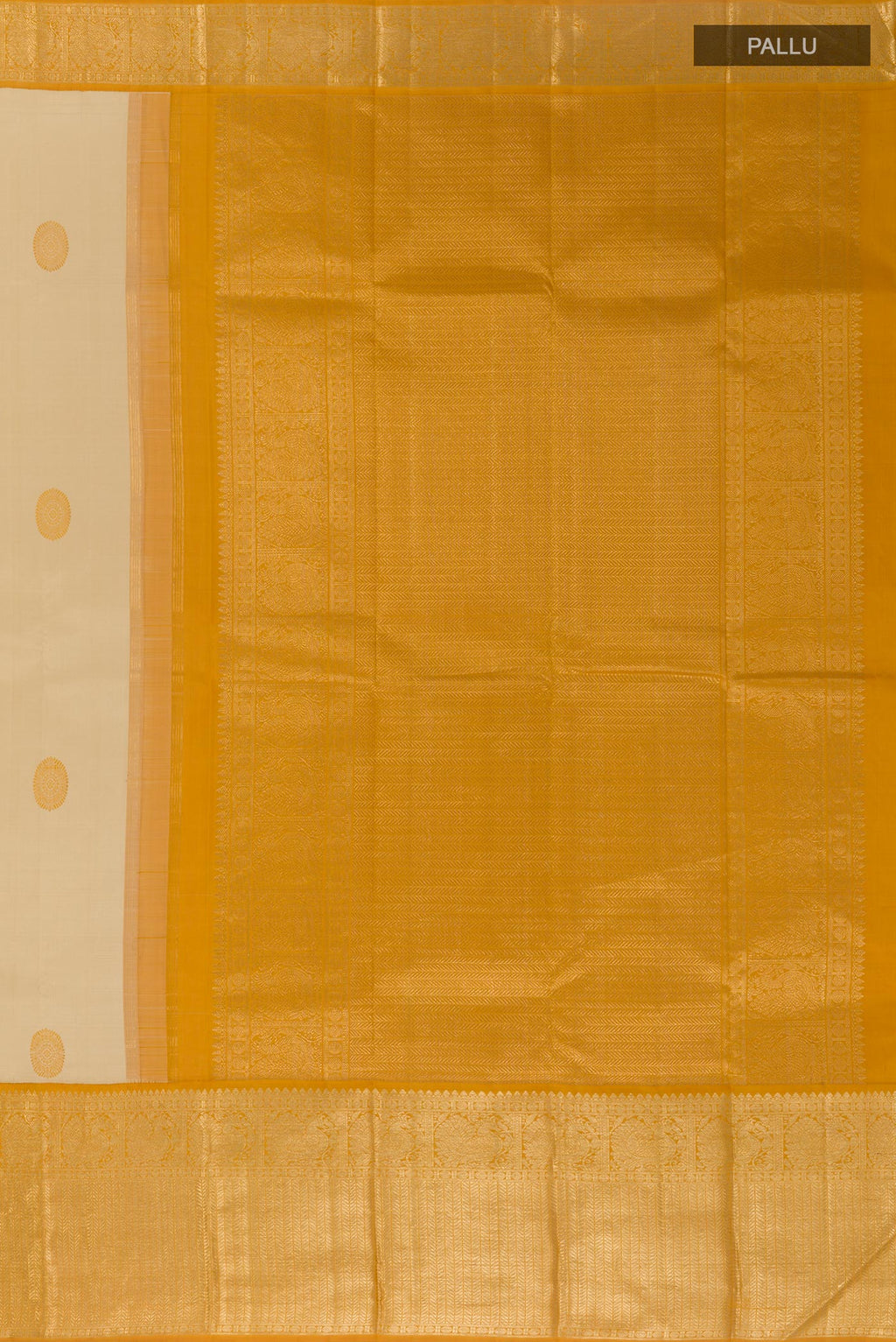 Close up image of the pallu of Cream Kanjivaram Silk Saree with Thread Butta on the body and Zari Border. 