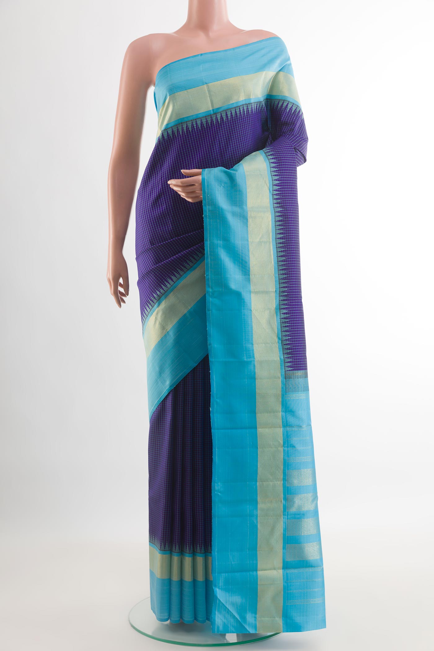 Blue Kanjivaram Silk Saree with Checked design on the body and Zari Border.  displayed on a mannequin