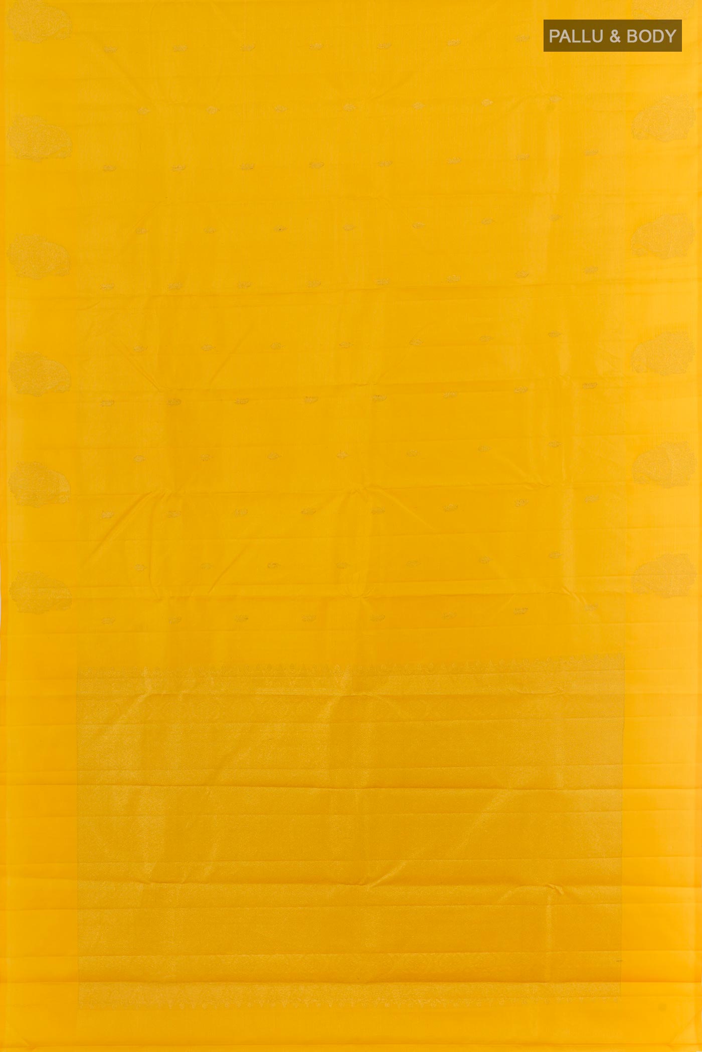 Flat view of Yellow Kanchipuram Silk Saree with Zari Butta on the body and Zari Border. 