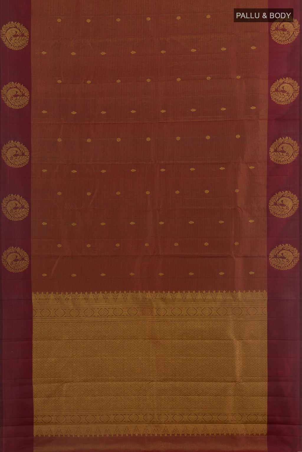 Flat view of Maroon Kanchipuram Silk Saree with Zari Butta on the body and Zari Border. 