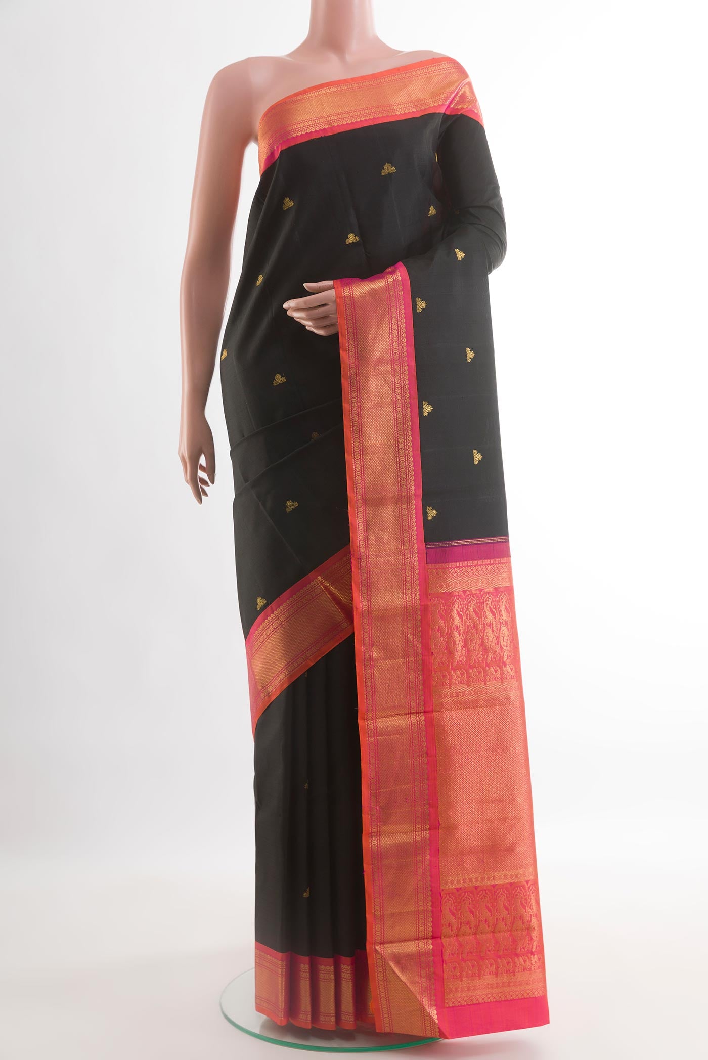 Black Kanjivaram Silk Saree with Zari Butta on the body and Zari Border.  displayed on a mannequin