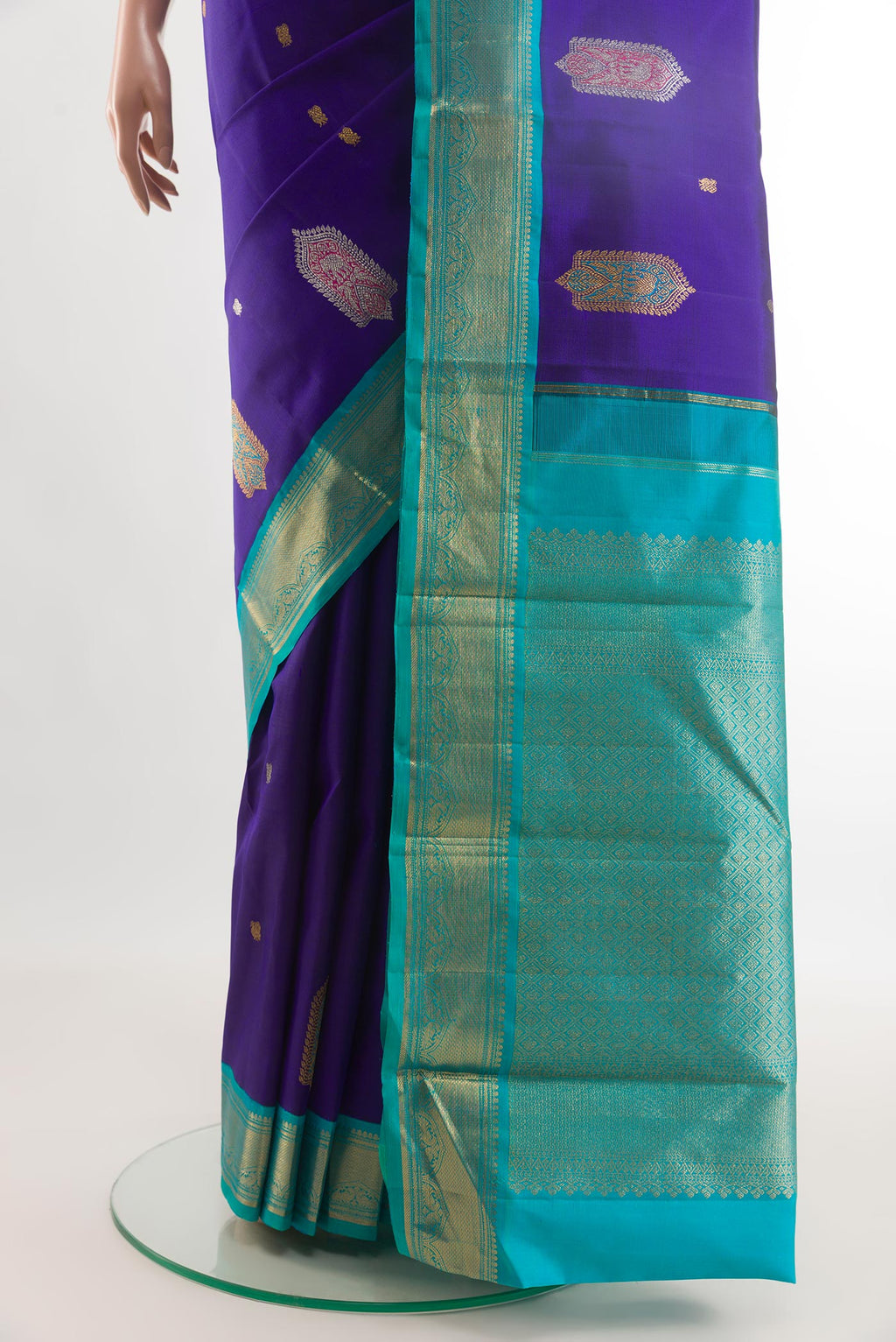 Pleats and pallu of Blue Kanjivaram Silk Saree with Zari Butta on the body and Zari Border. 