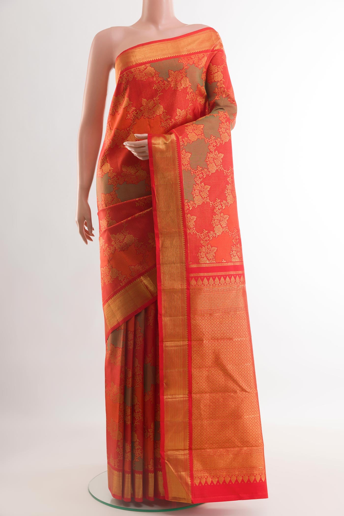 Multi Color Kanchipuram Silk Saree with Zari Brocade on the body and Zari Border.  displayed on a mannequin