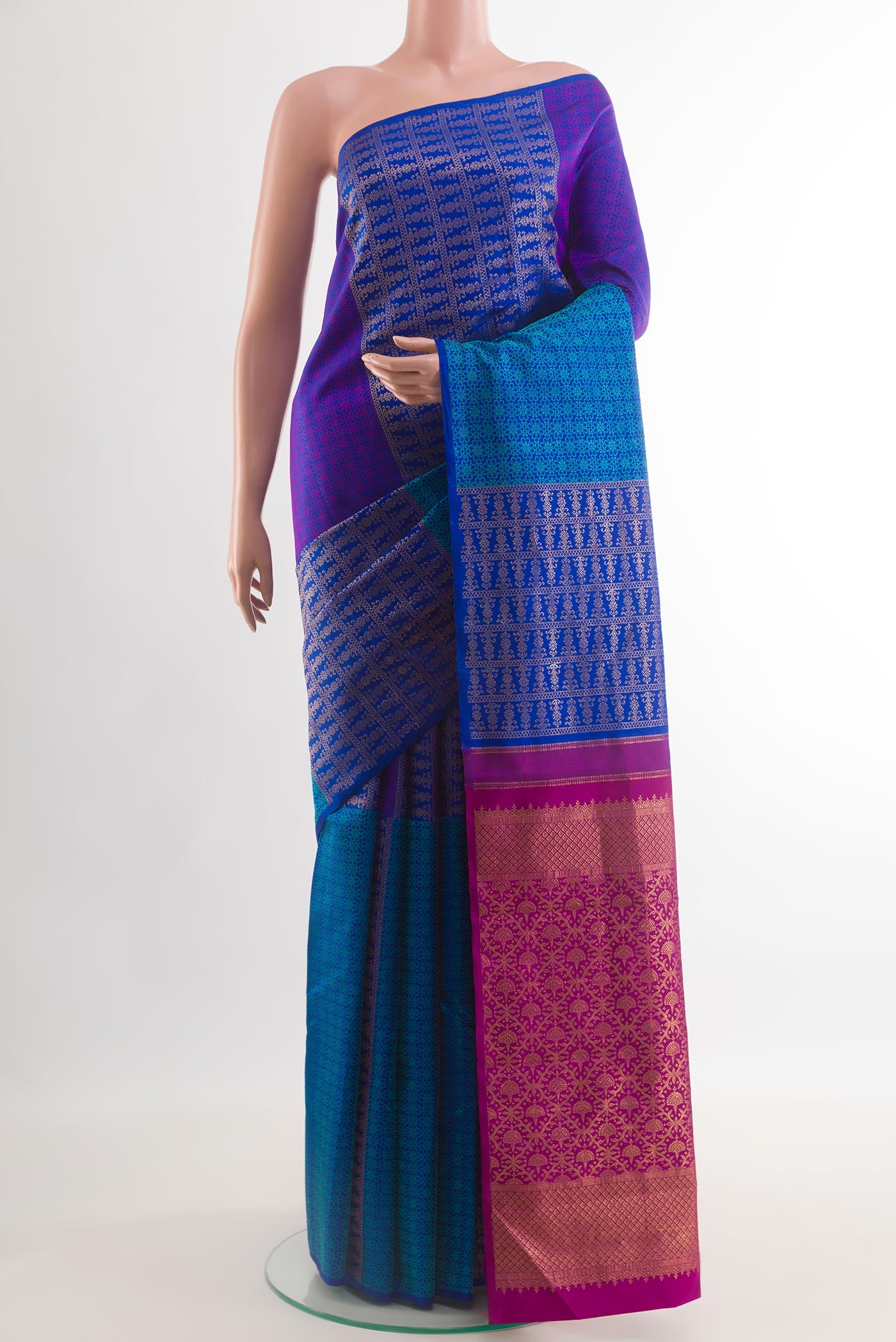 Blue Kanjivaram Silk Saree with Zari Brocade on the body and Zari Border.  displayed on a mannequin