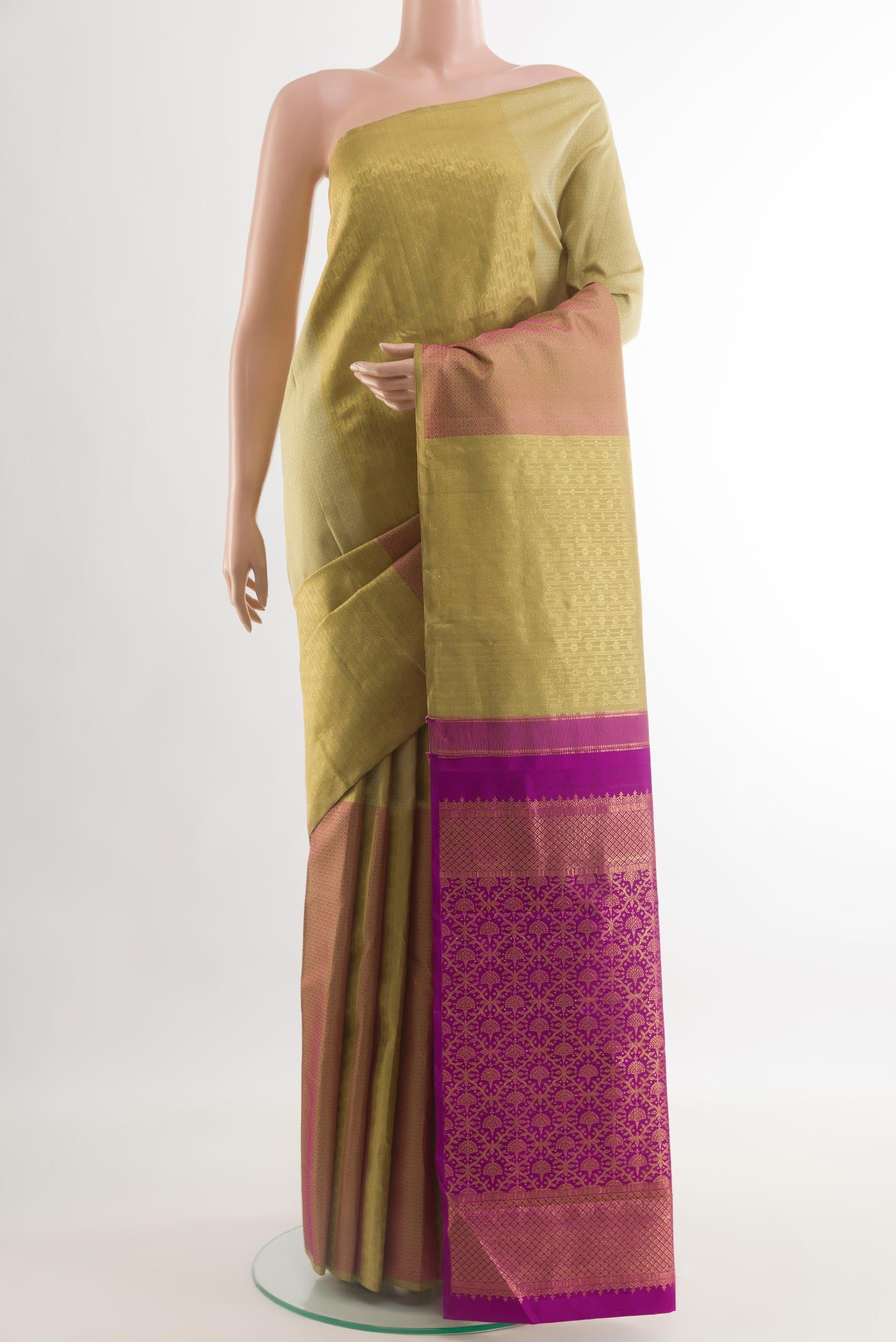 Beige Kanjivaram Silk Saree with Zari Brocade on the body and Zari Border.  displayed on a mannequin