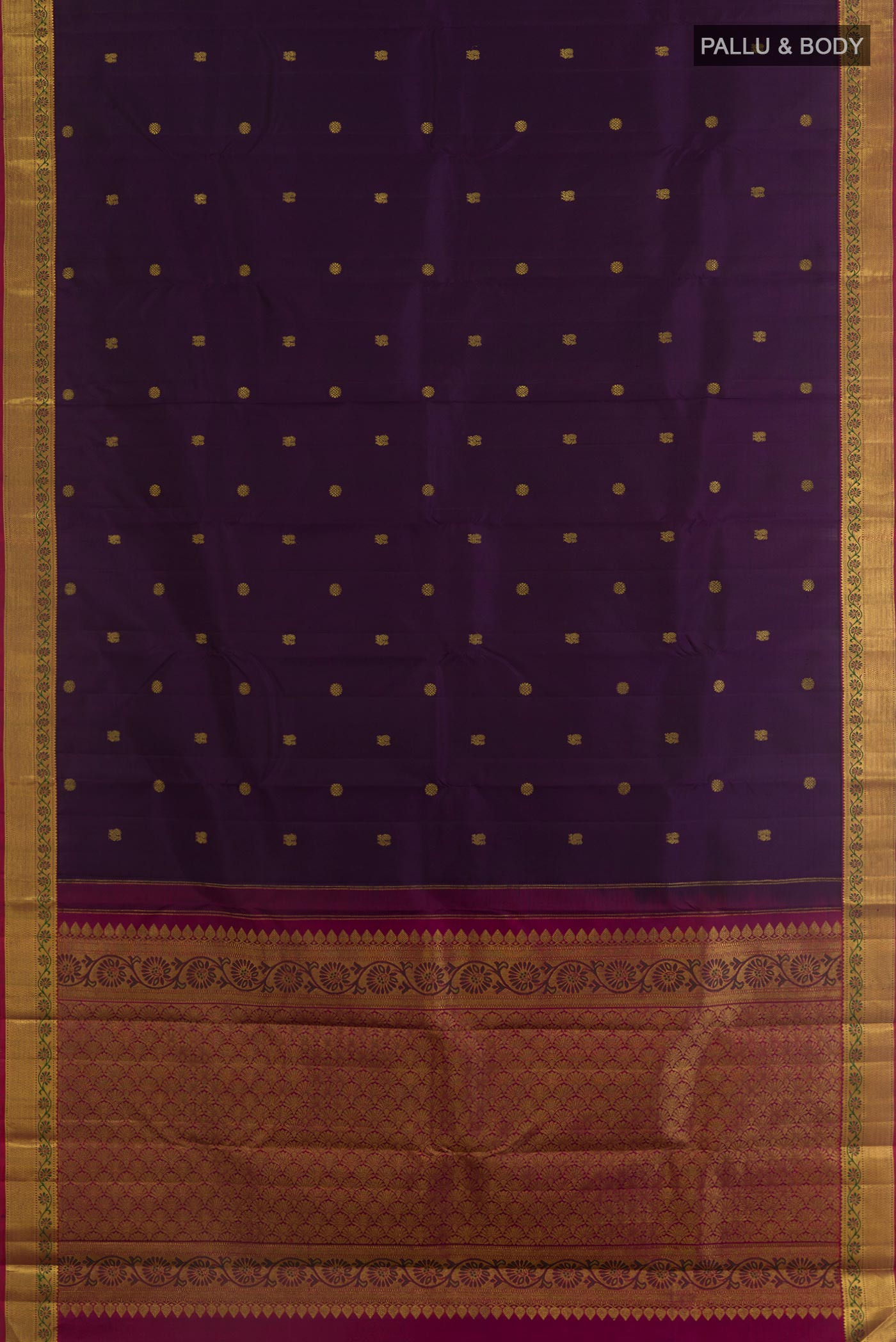 Flat view of Purple Kanchipuram Silk Saree with Zari Butta on the body and Zari Border. 