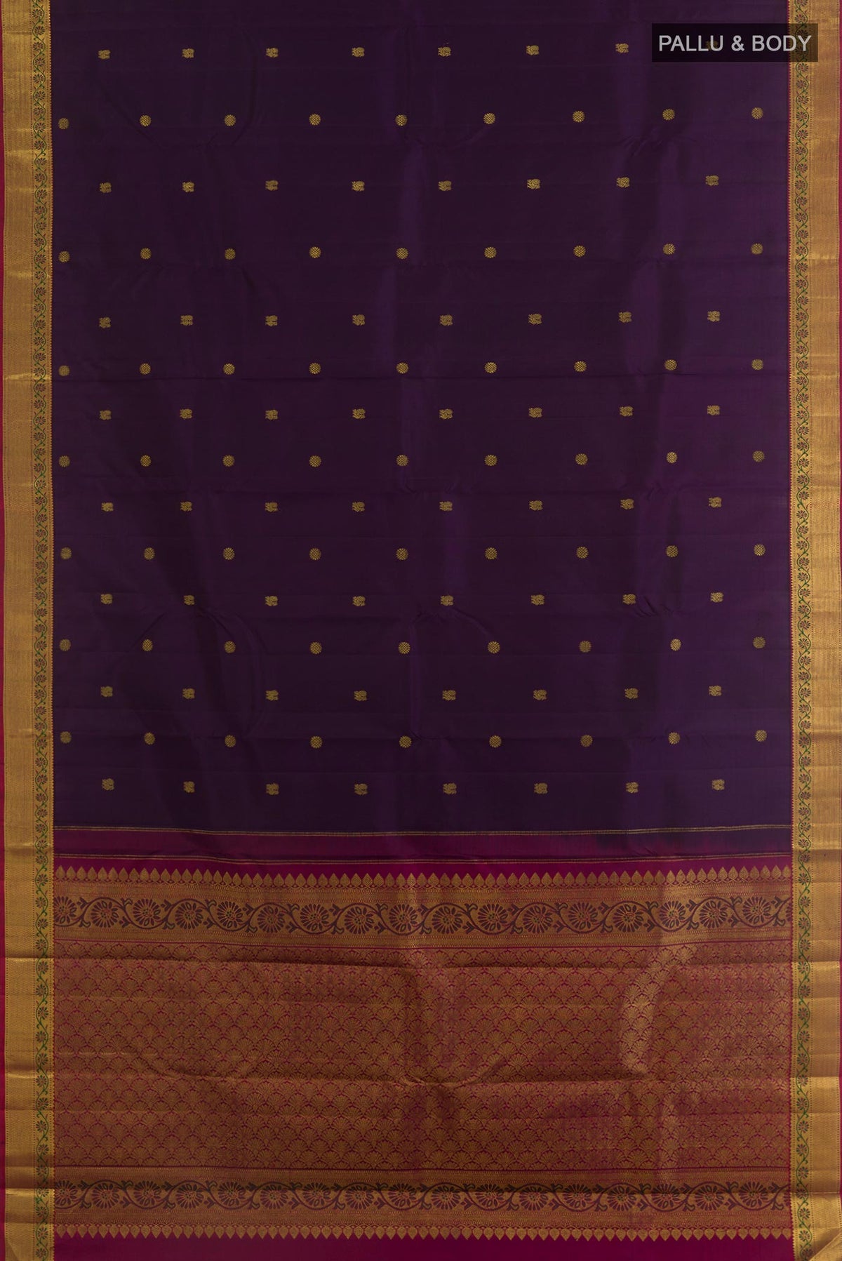 Flat view of Purple Kanchipuram Silk Saree with Zari Butta on the body and Zari Border. 
