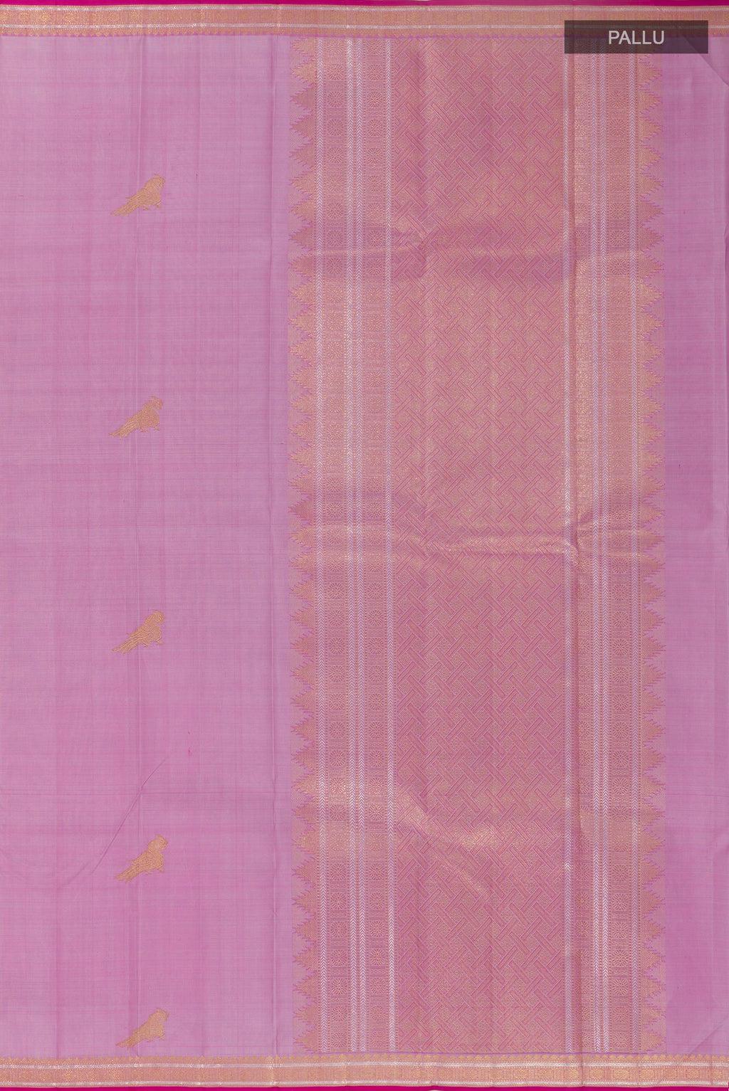 Close up image of the pallu of Lavender Kanjivaram Silk Saree with Zari Butta on the body and Zari Border. 