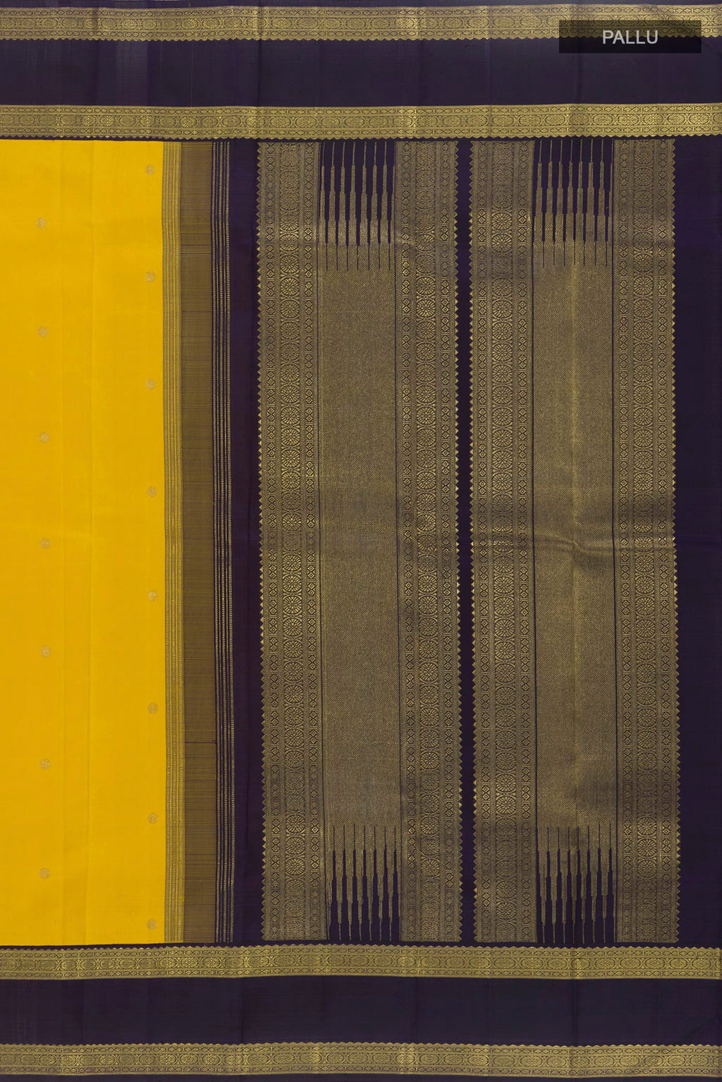 Close up image of the pallu of Yellow Kanchipuram Silk Saree with Zari Butta on the body and Zari Border. 