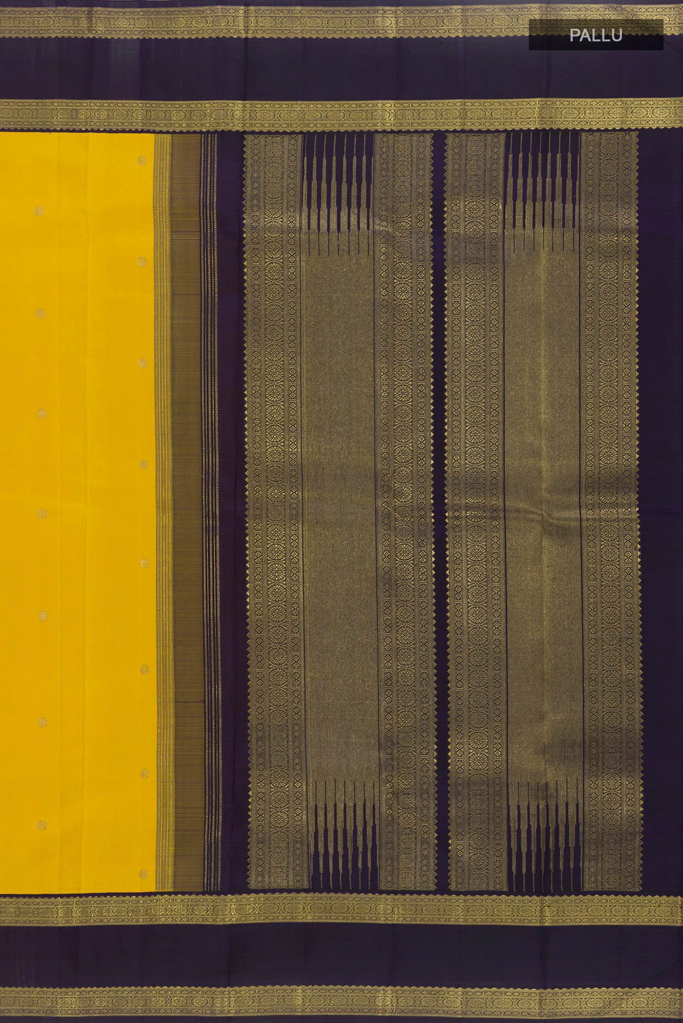 Close up image of the pallu of Yellow Kanchipuram Silk Saree with Zari Butta on the body and Zari Border. 