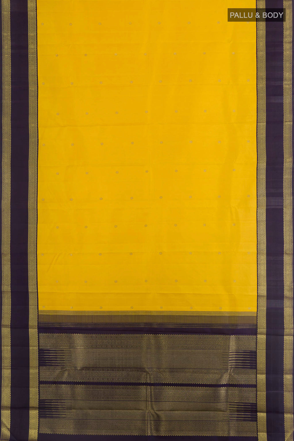 Flat view of Yellow Kanchipuram Silk Saree with Zari Butta on the body and Zari Border. 