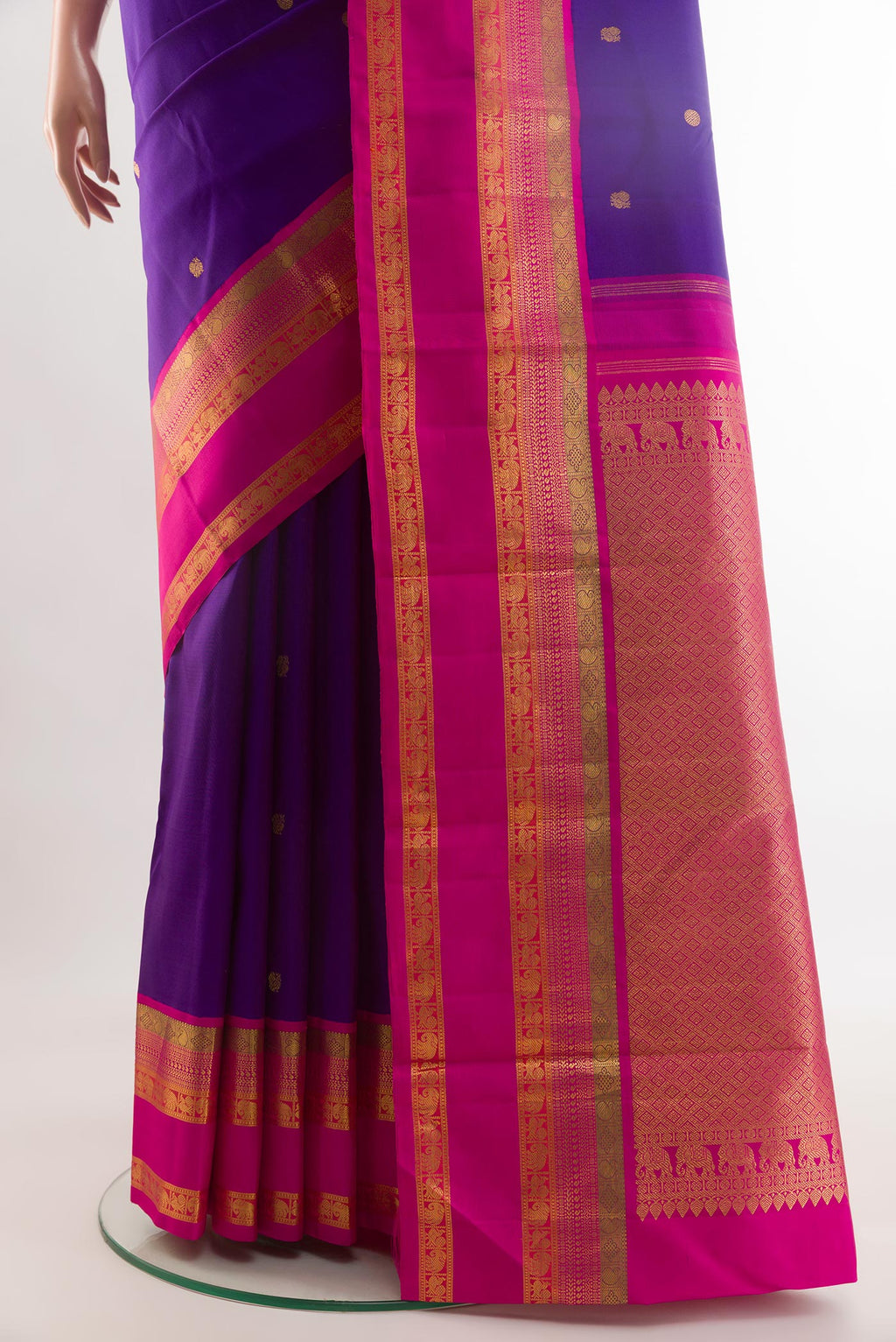 Pleats and pallu of Blue Kanchipuram Silk Saree with Zari Butta on the body and Zari Border. 