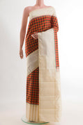 Multi Color Kanjivaram Silk Saree with Checked design on the body and Zari Border.  displayed on a mannequin