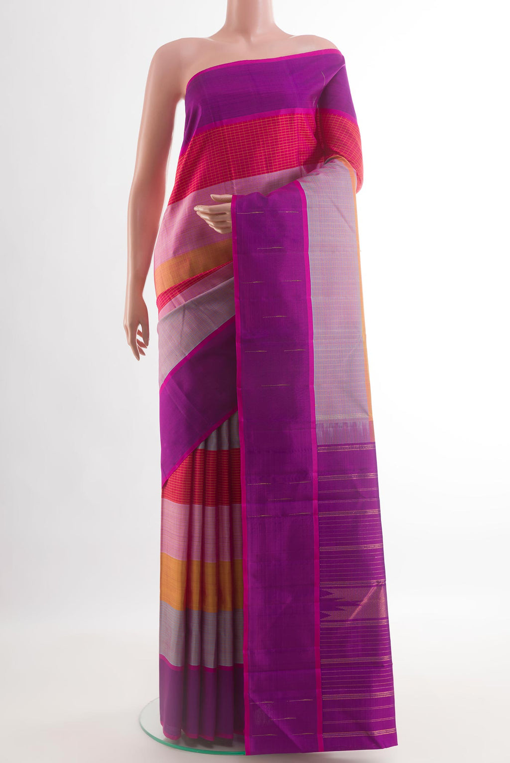 Multi Color Kanjivaram Silk Saree with Stripes on the body and Plain Border.  displayed on a mannequin
