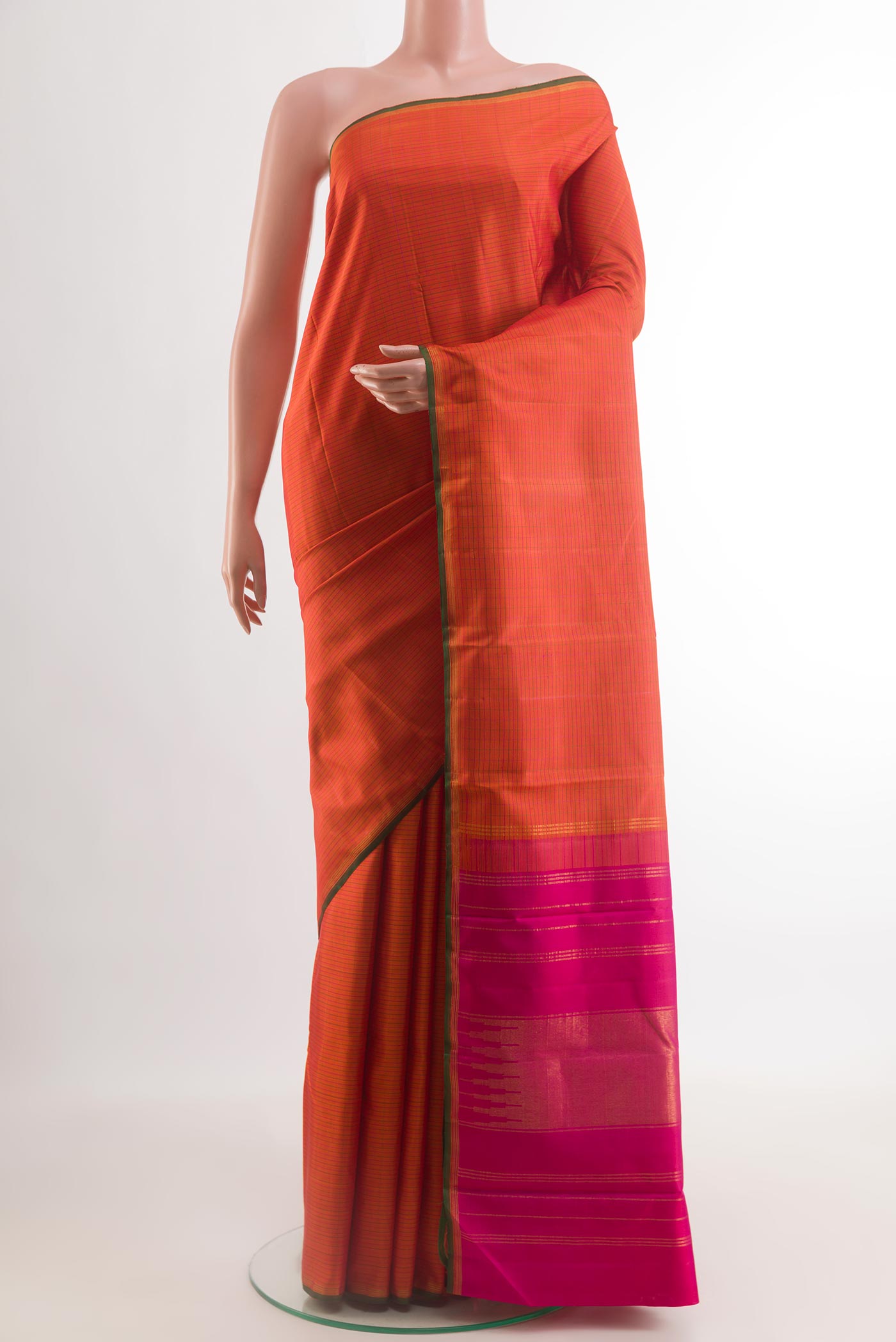 Orange Kanchipuram Silk Saree with Checked design on the body and Zari Border.  displayed on a mannequin