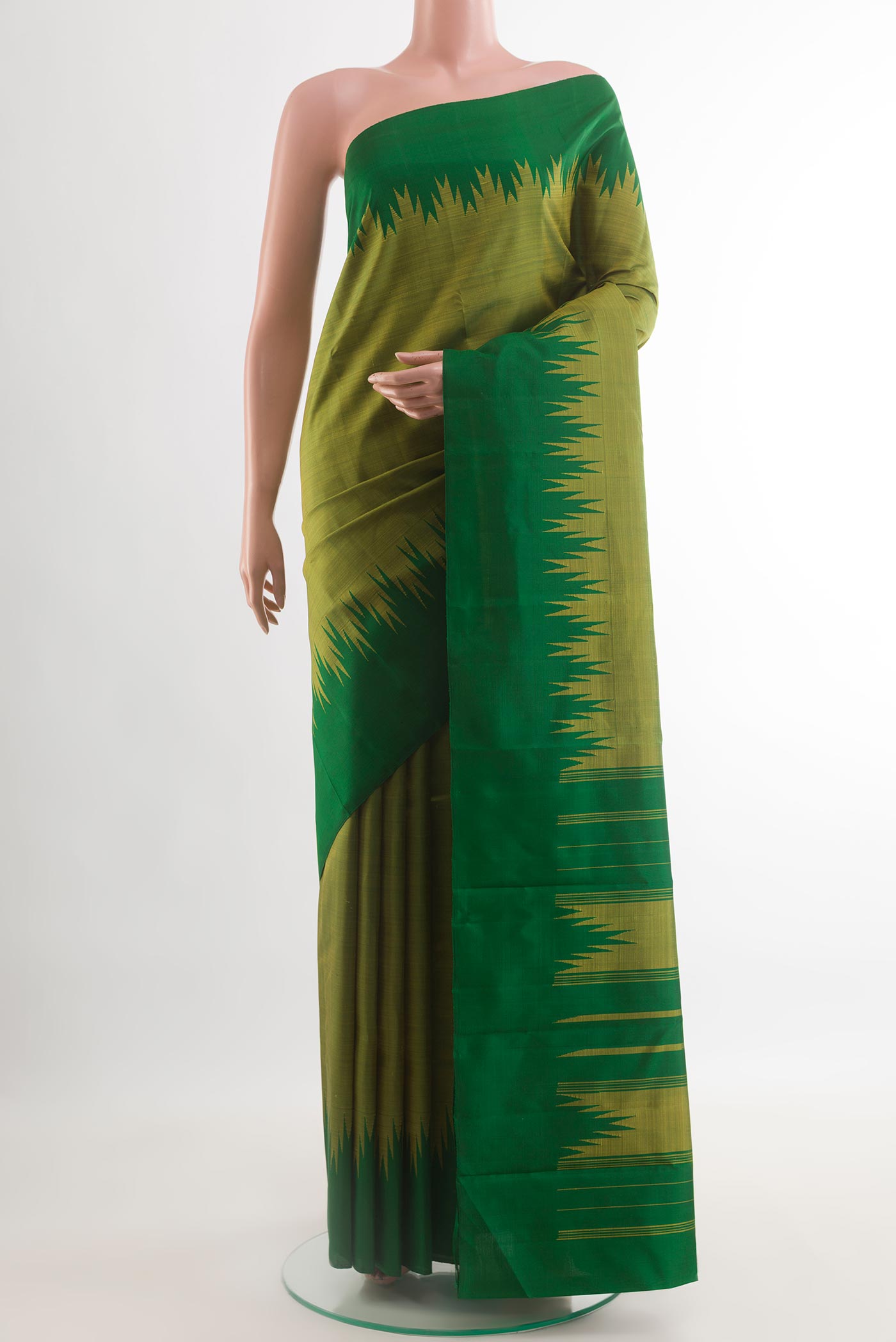 Mehandi Green Kanjivaram Silk Saree with Plain Body and Temple Border.  displayed on a mannequin