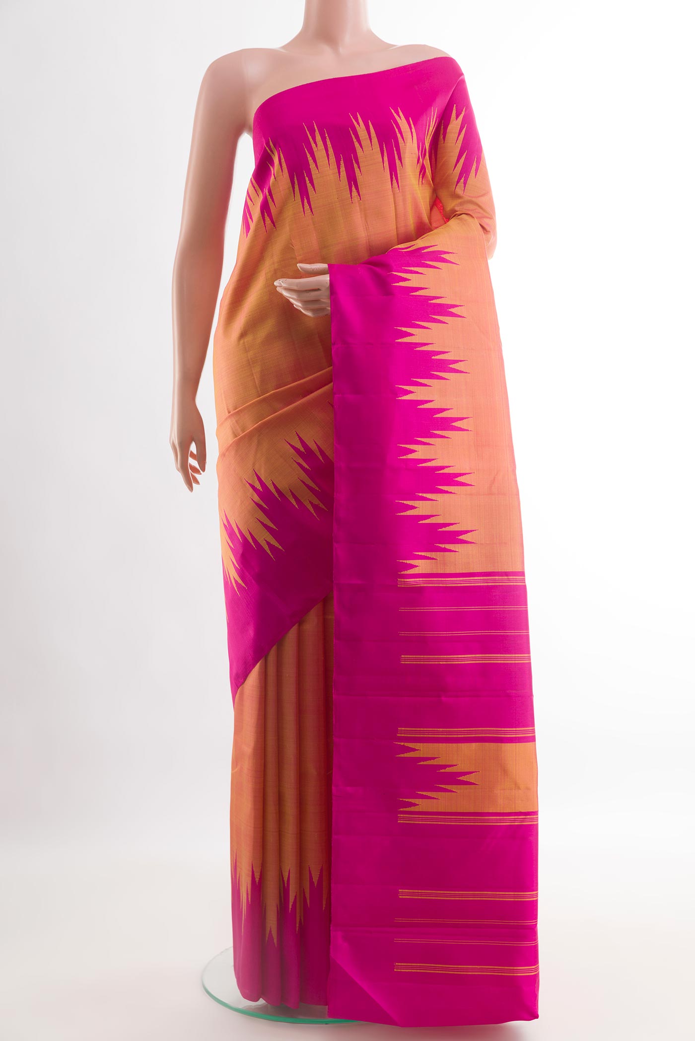 Brick Orange Kanjivaram Silk Saree with Plain Body and Temple Border.  displayed on a mannequin