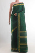 Pure Silk Bottle Green Kanchipuram Saree with Zari Butta on the body and Zari Border.  displayed on a mannequin