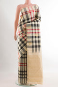 Multi Color Kanchipuram Silk Saree with Checked design on the body and Without Border.  displayed on a mannequin
