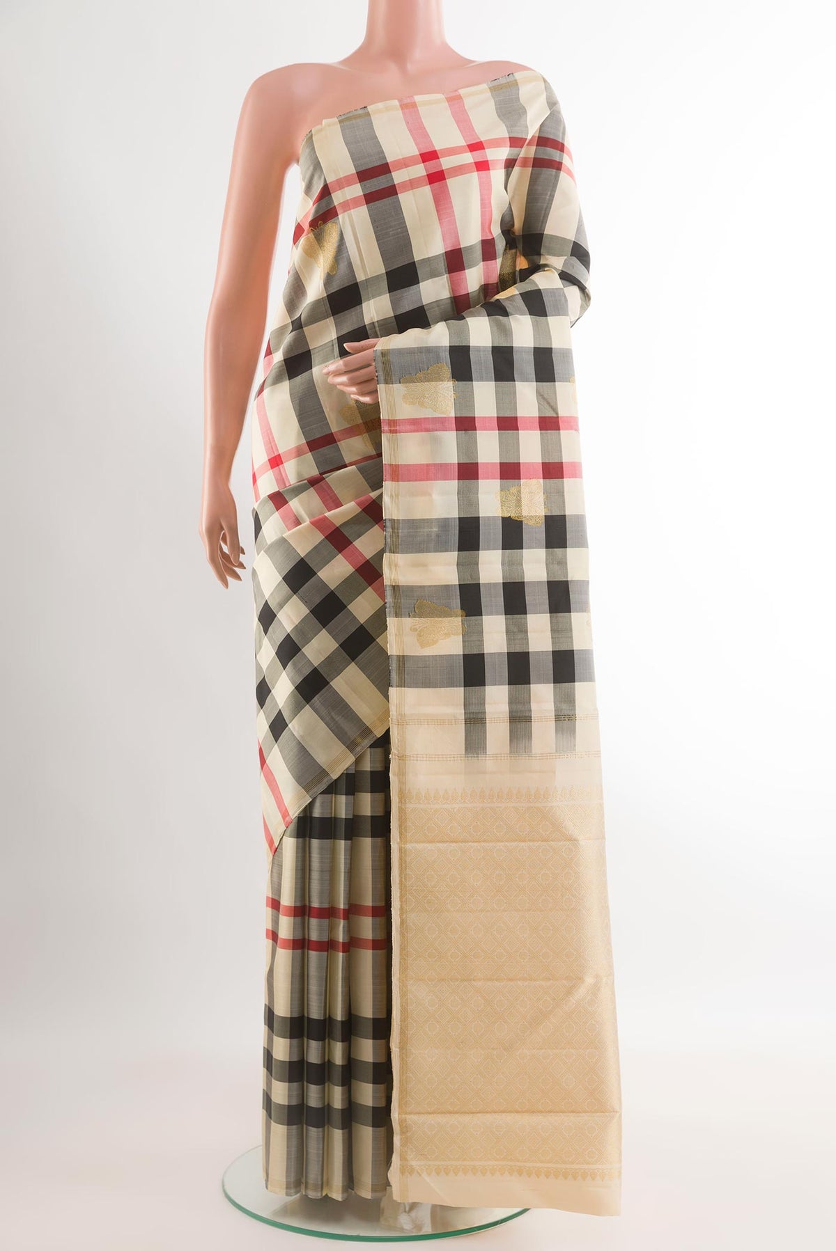 Multi Color Kanchipuram Silk Saree with Checked design on the body and Without Border.  displayed on a mannequin