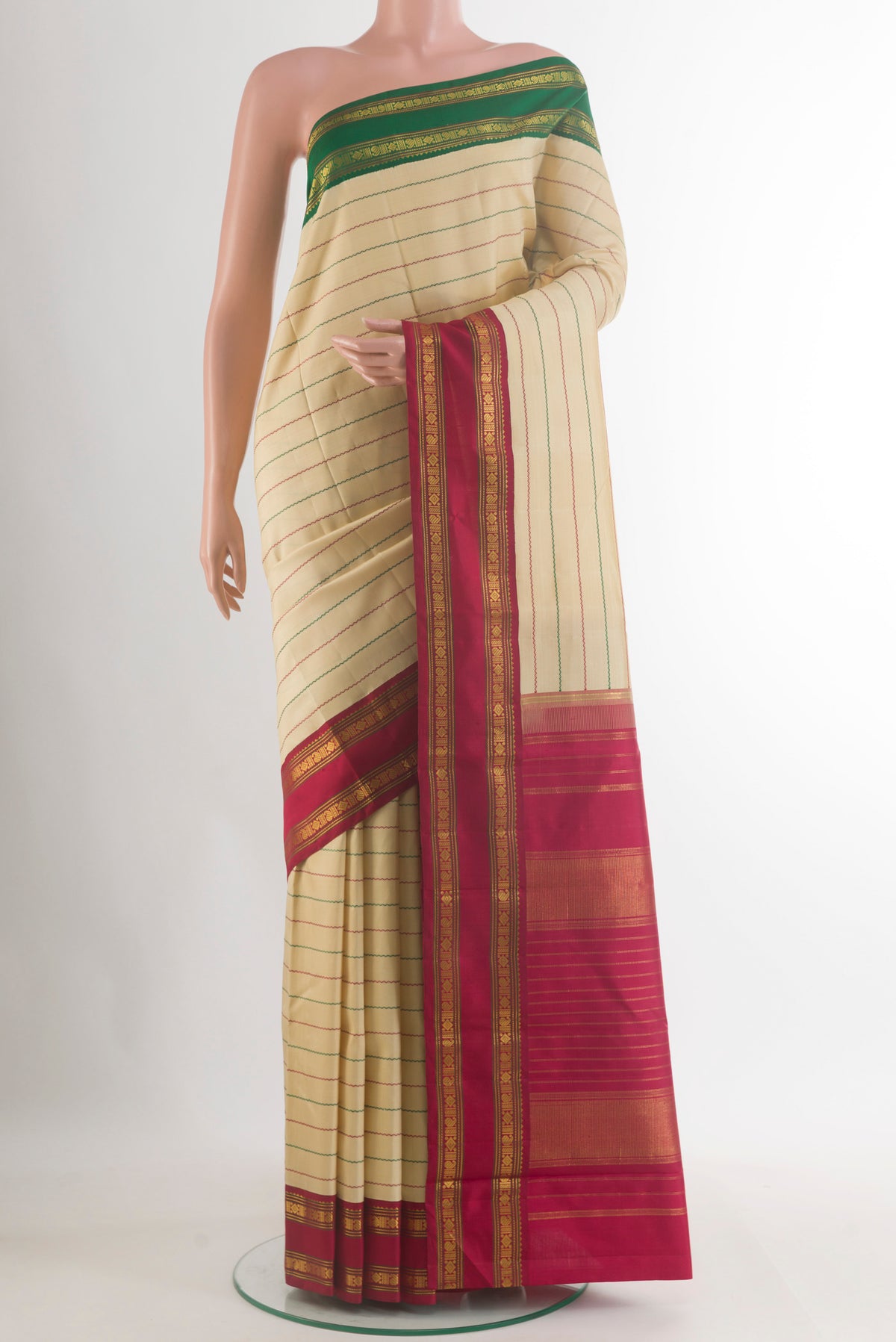Pure Silk Sandal Kanjivaram Saree with Stripes on the body and Ganga Jamuna Border.  displayed on a mannequin