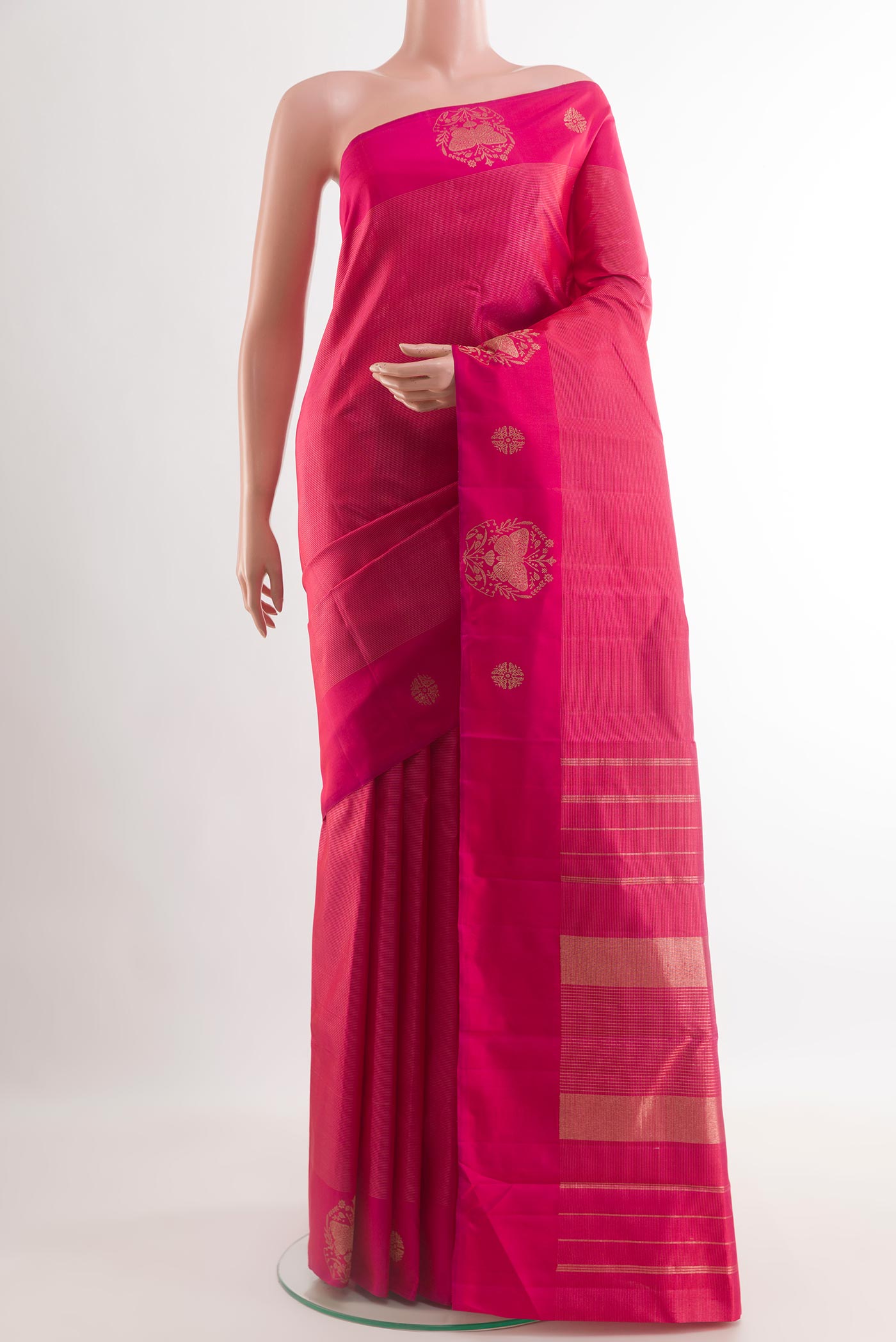 Pink Kanchipuram Silk Saree with Zari Brocade on the body and Zari Border.  displayed on a mannequin