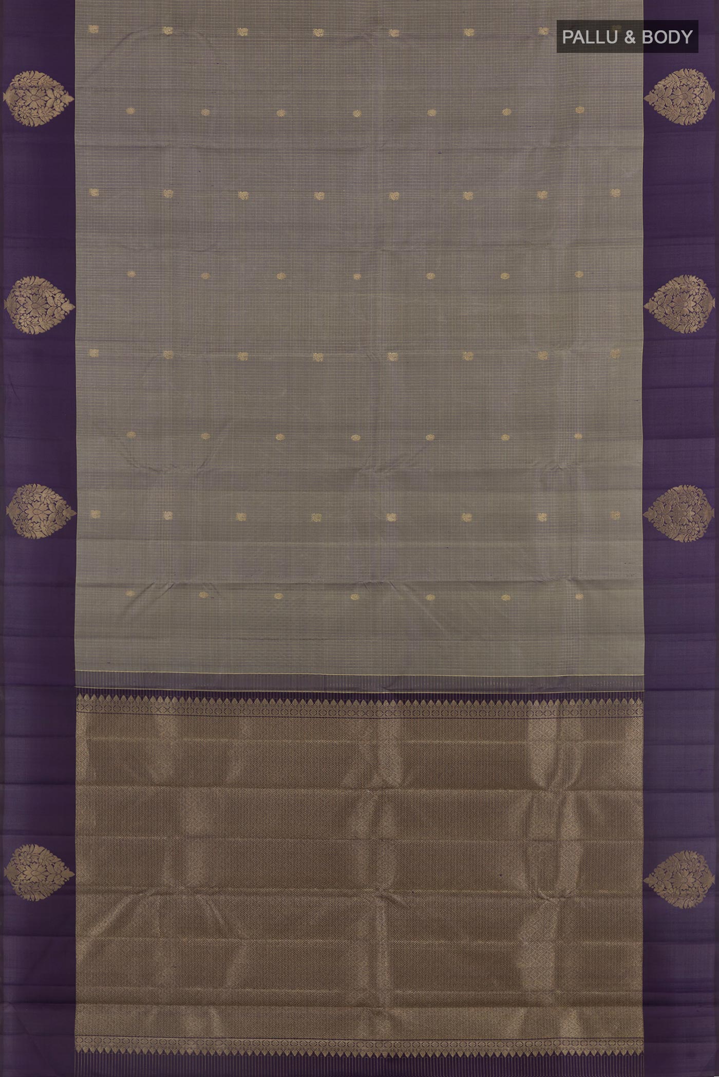 Flat view of Grey Kanjivaram Silk Saree with Zari Butta on the body and Zari Border. 