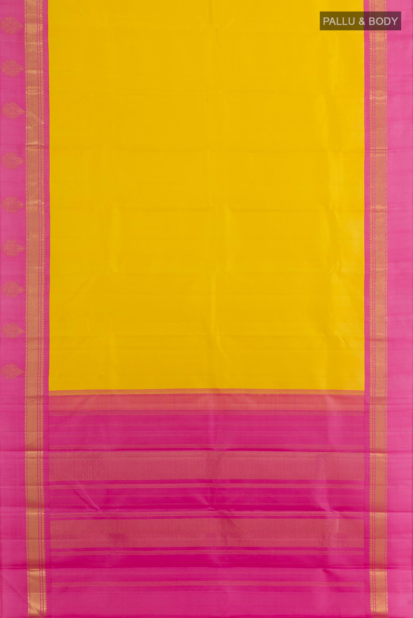 Flat view of Yellow Kanjivaram Silk Saree with Plain Body and Zari Border. 