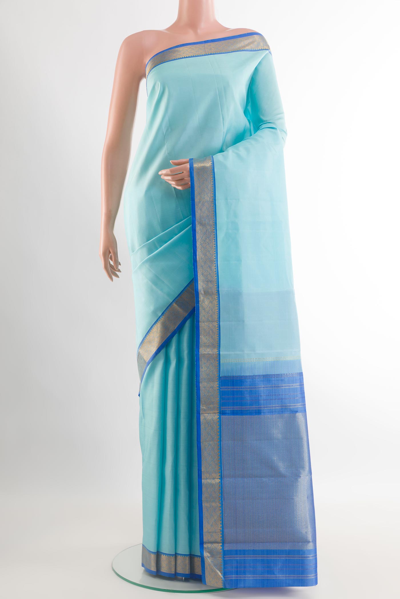 Sky Blue Kanjivaram Silk Saree with Plain Body and Zari Border.  displayed on a mannequin