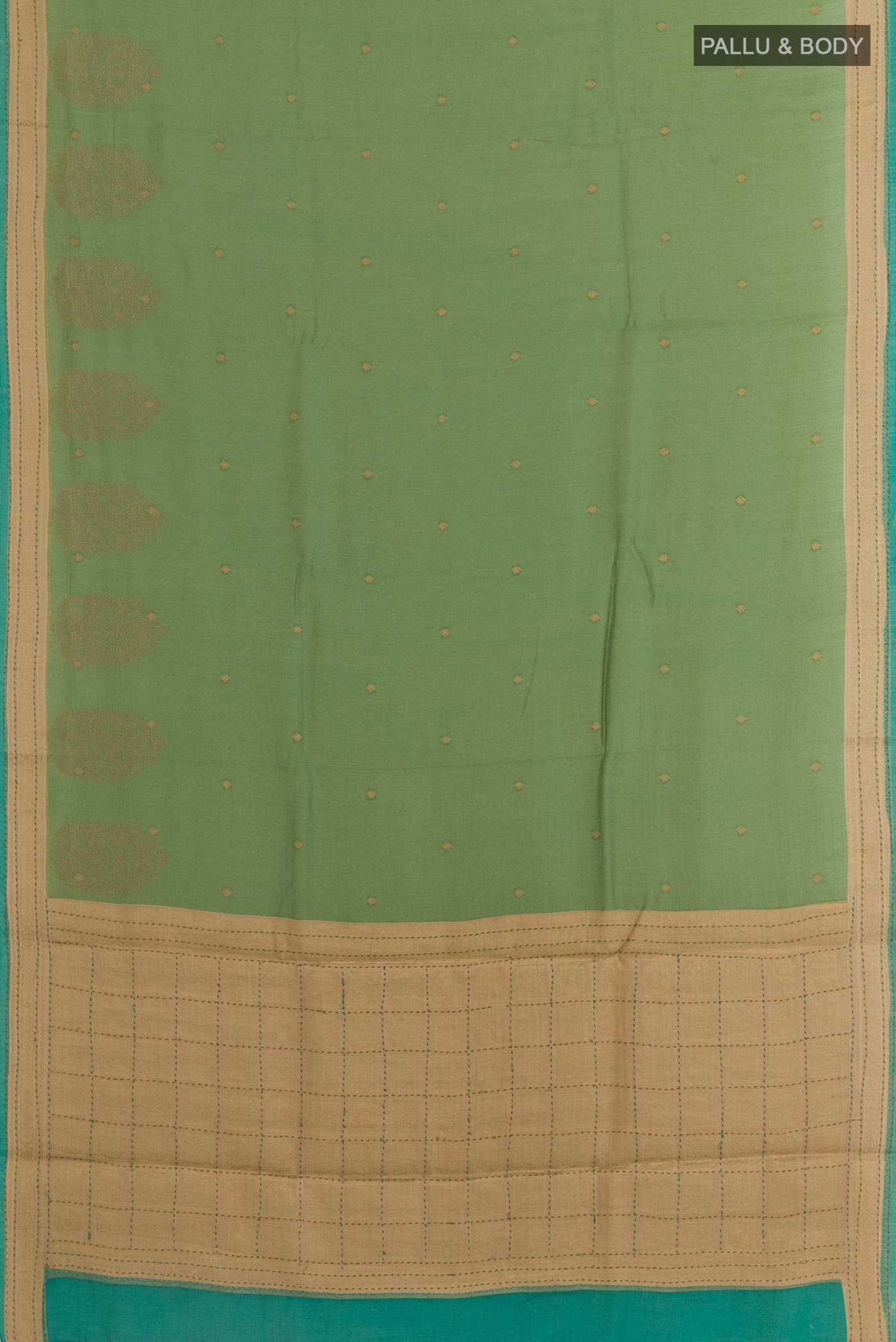 Flat view of Green Tussar Silk Saree with Zari Butta on the body and Zari Border. 