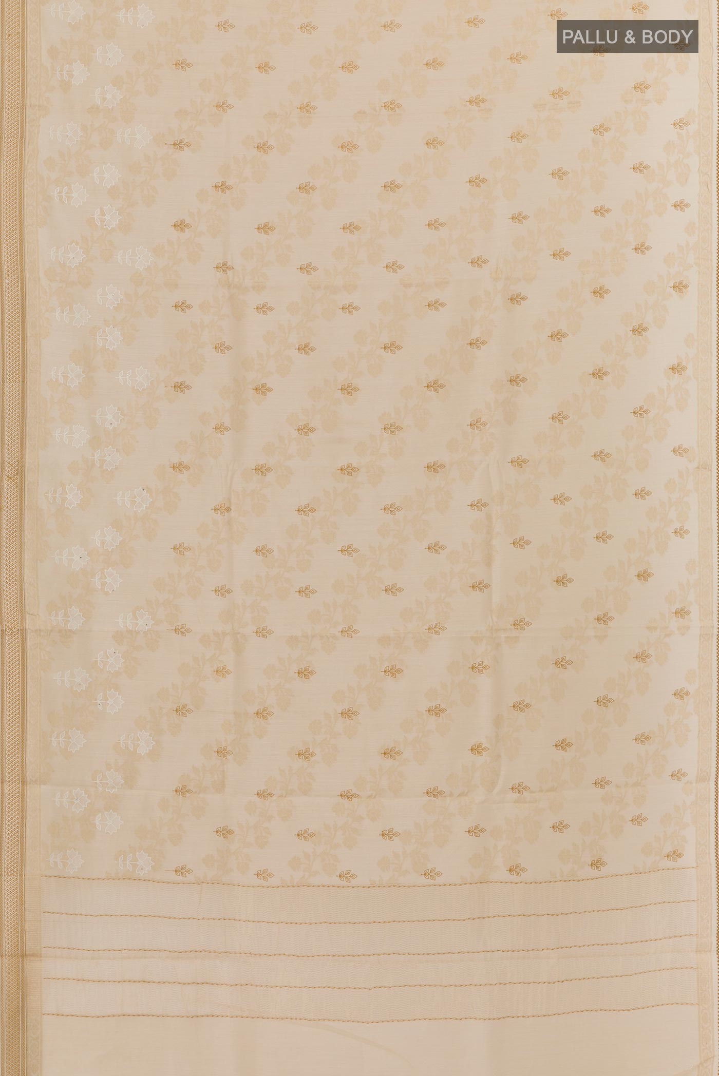 Flat view of Cream Tussar Silk Saree with Embroidery on the body and Zari Border. 
