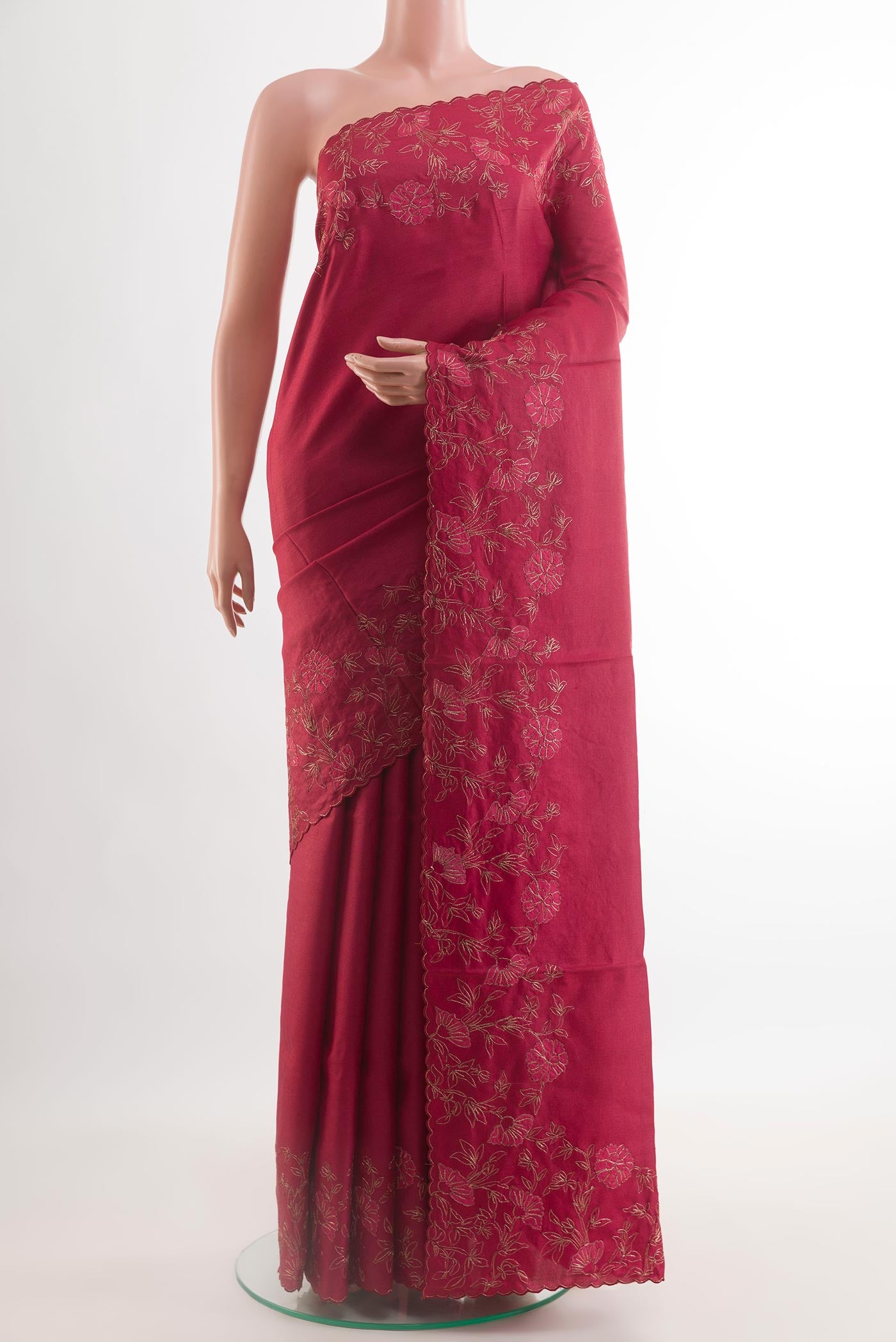 Maroon Tussar Silk Saree with Plain Body and Embroidery Border.  displayed on a mannequin