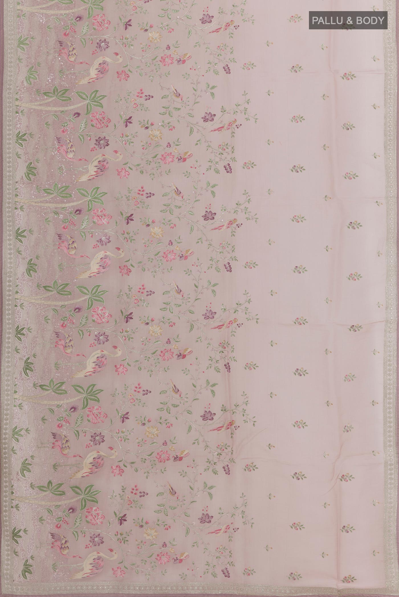 Flat view of Lavender Organza Silk Saree with Embroidery on the body and Embroidery Border. 