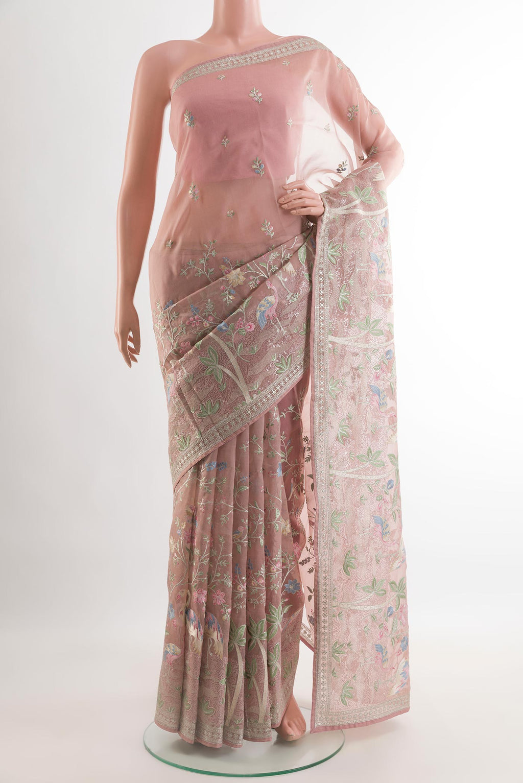 Pink Organza Silk Saree with Embroidery on the body and Plain Border.  displayed on a mannequin