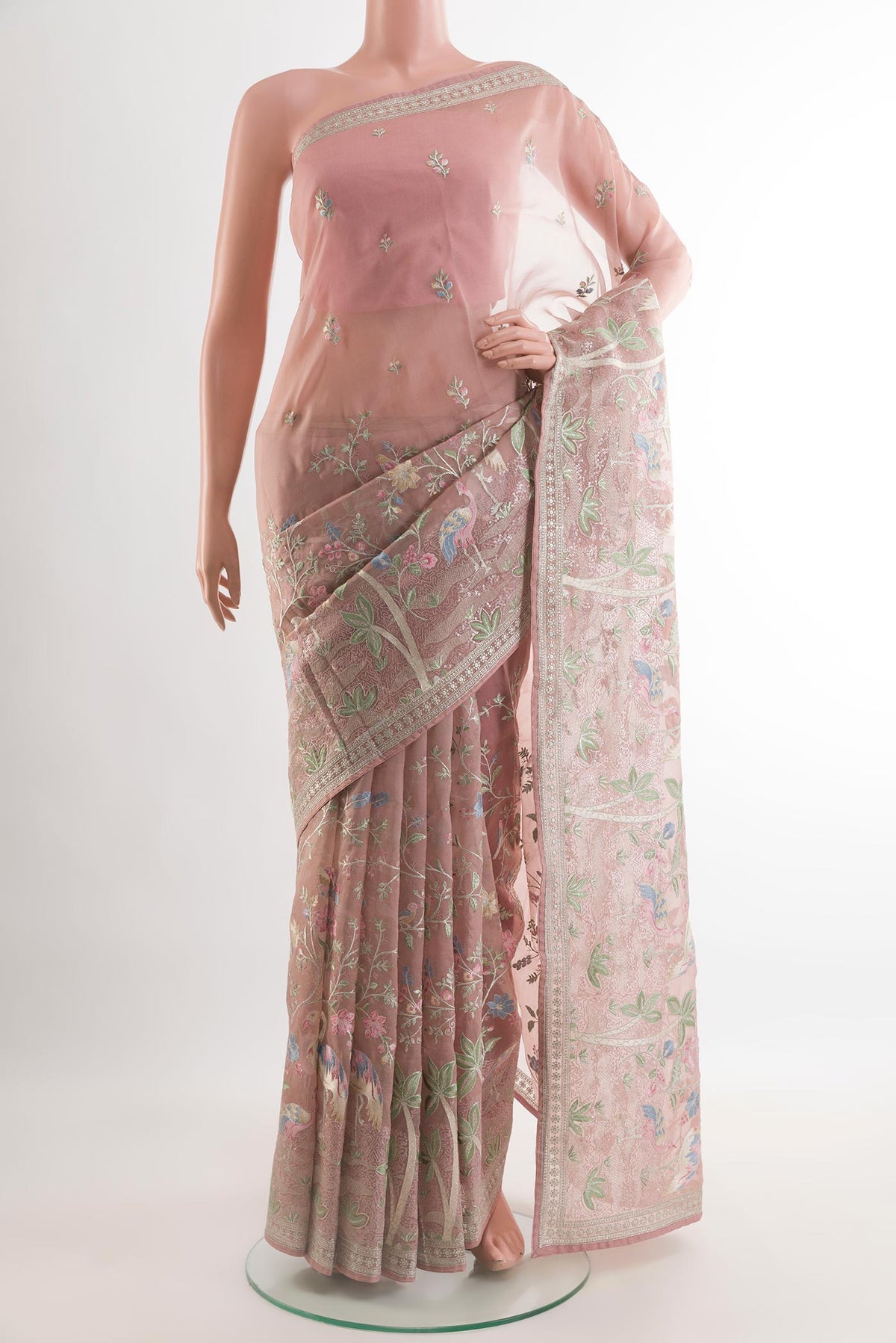 Pink Organza Silk Saree with Embroidery on the body and Plain Border.  displayed on a mannequin