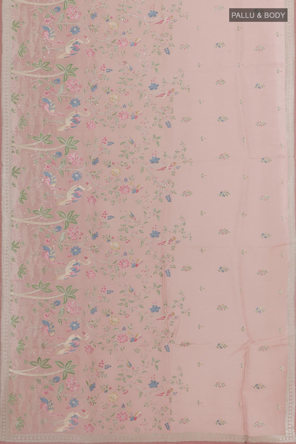 Flat view of Pink Organza Silk Saree with Embroidery on the body and Plain Border. 
