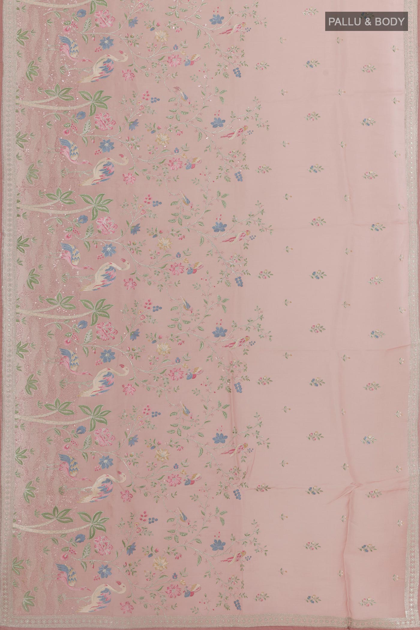 Flat view of Pink Organza Silk Saree with Embroidery on the body and Plain Border. 