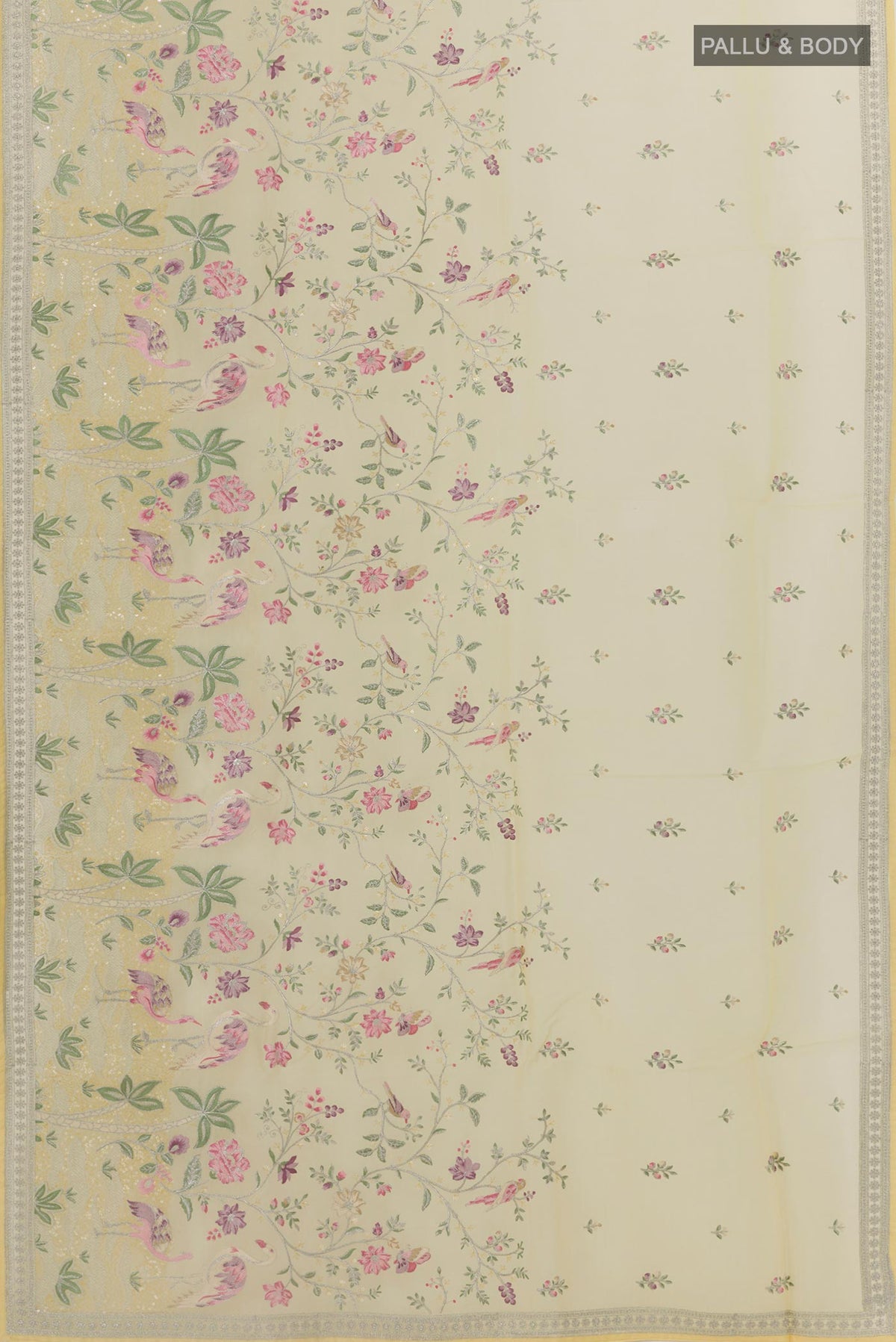 Flat view of Lemon Yellow Organza Silk Saree with Embroidery on the body and Embroidery Border. 