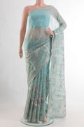 Pure Silk Light Blue Organza Saree with Embroidery on the body and Embroidery Border.  displayed on a mannequin