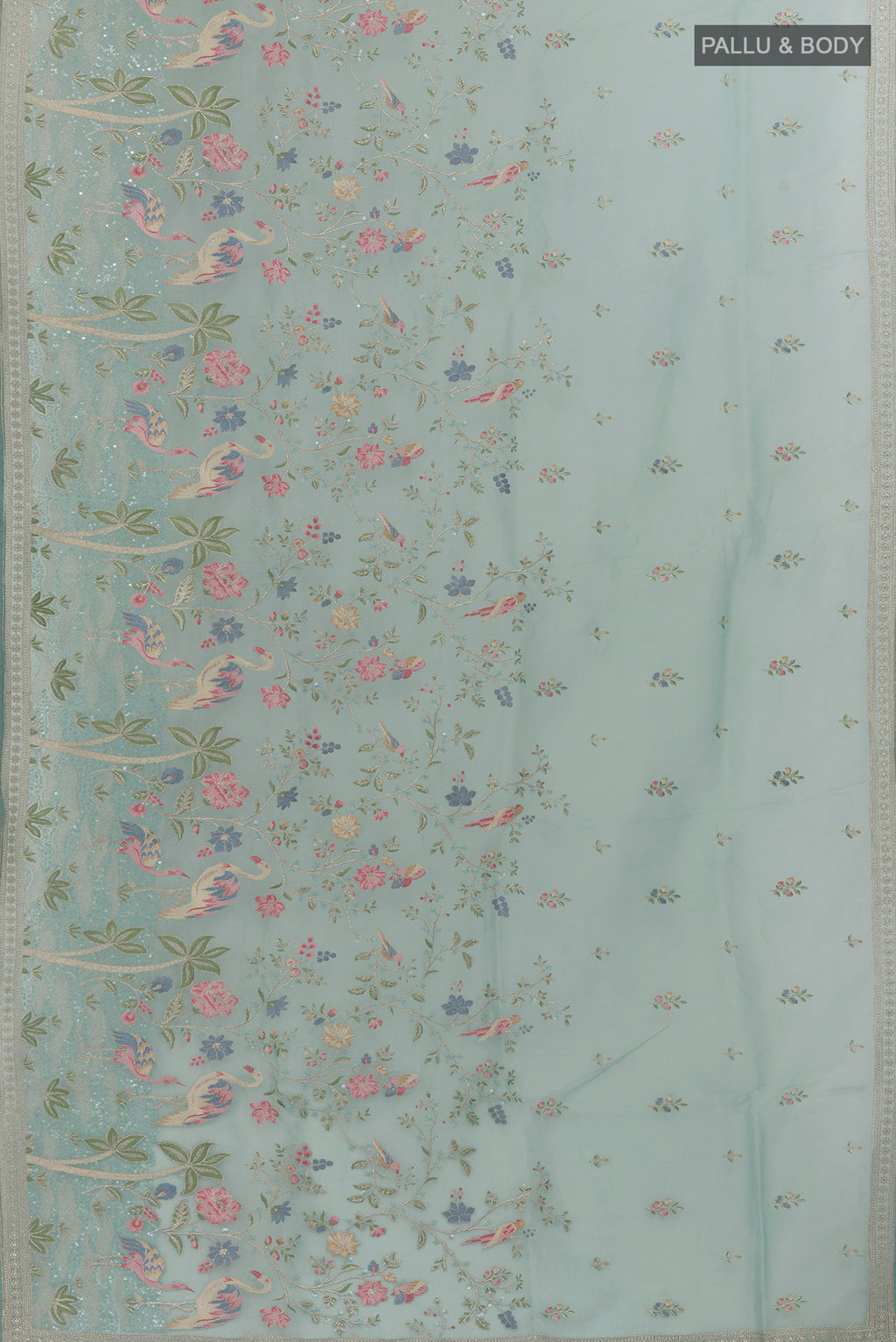 Flat view of Pure Silk Light Blue Organza Saree with Embroidery on the body and Embroidery Border. 