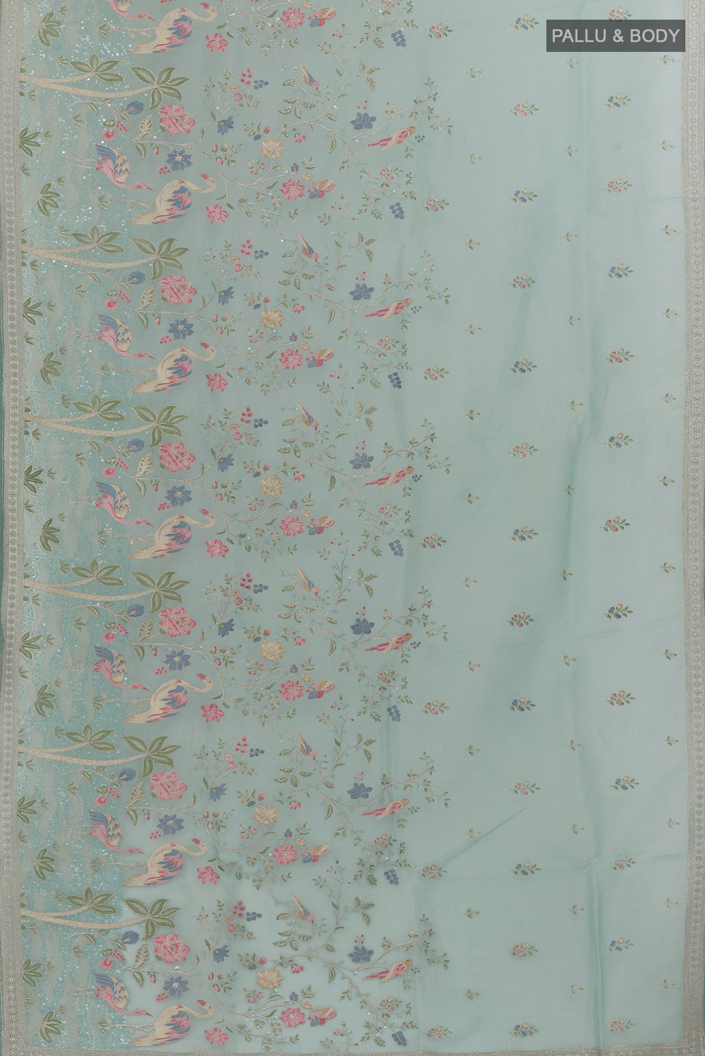 Flat view of Pure Silk Light Blue Organza Saree with Embroidery on the body and Embroidery Border. 